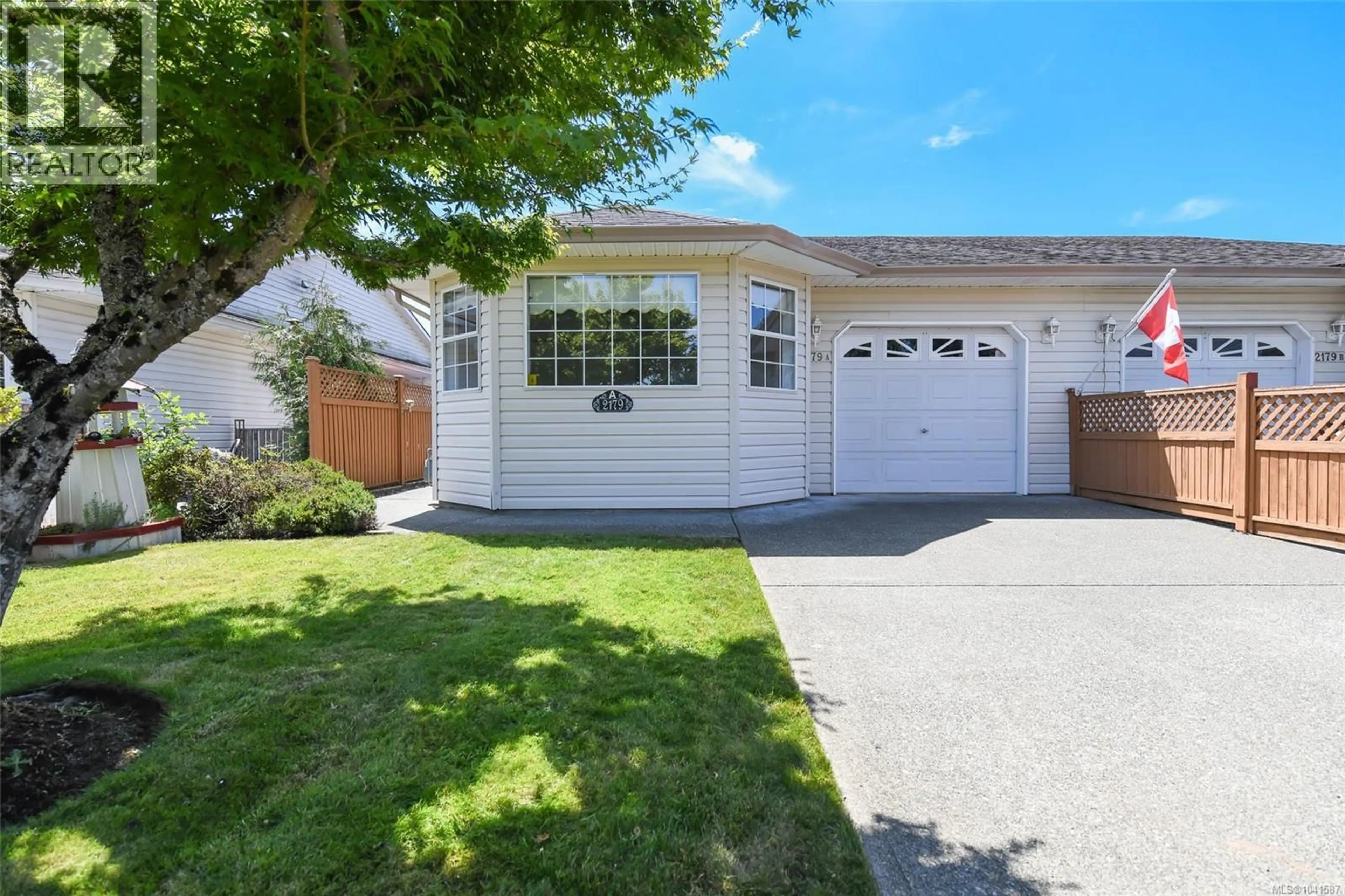 Home with vinyl exterior material, street for A - 2179 URQUHART AVENUE, Courtenay British Columbia V9N7W3