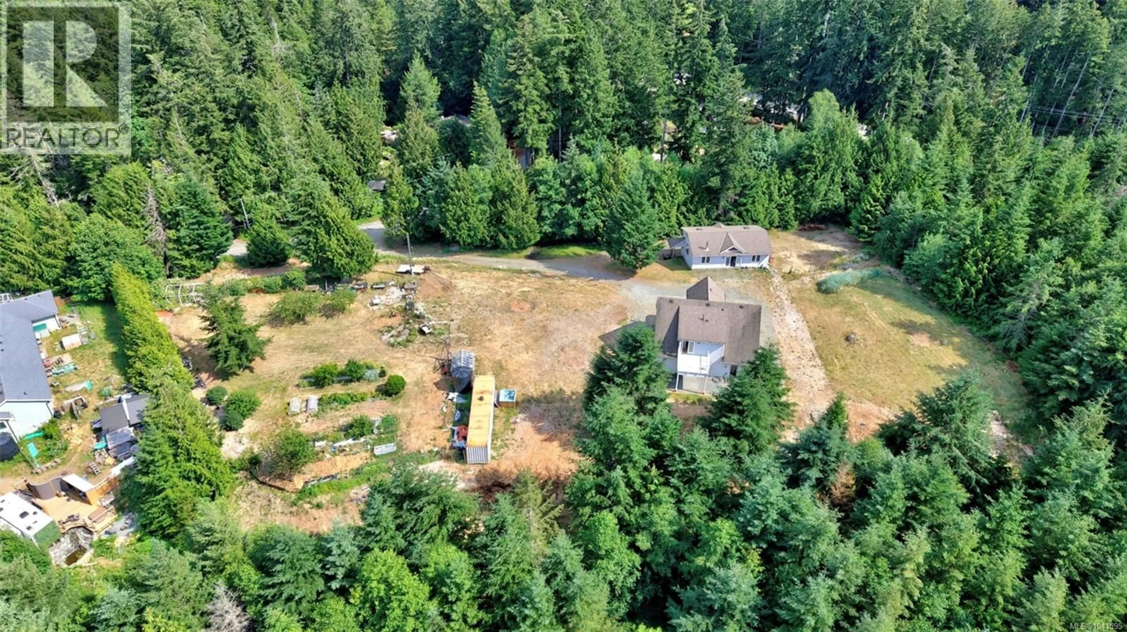 A pic from outside/outdoor area/front of a property/back of a property/a pic from drone, forest/trees view for 2920 YOUNG LAKE ROAD, Sooke British Columbia V9Z0J6