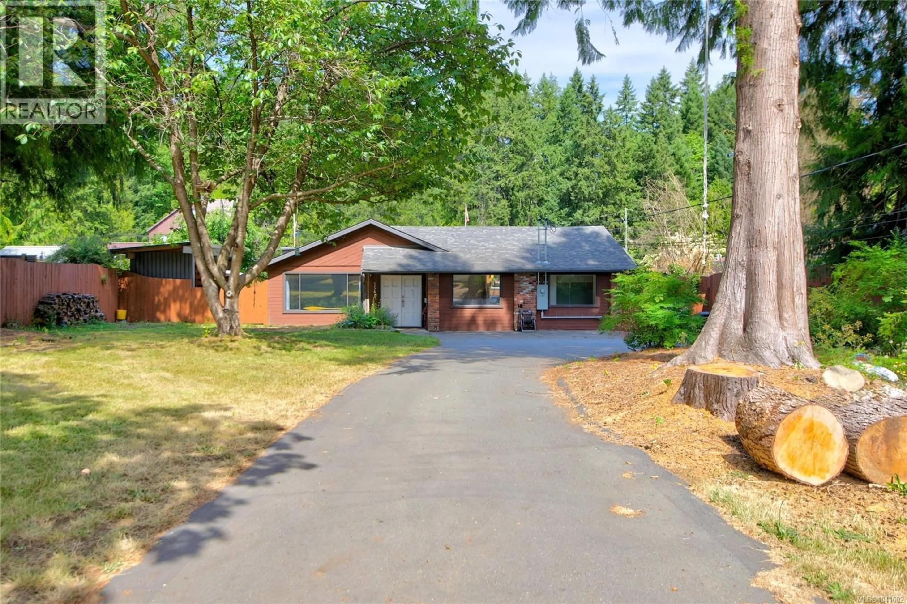 A pic from outside/outdoor area/front of a property/back of a property/a pic from drone, street for 2561 MABLEY ROAD, Courtenay British Columbia V9N9K2