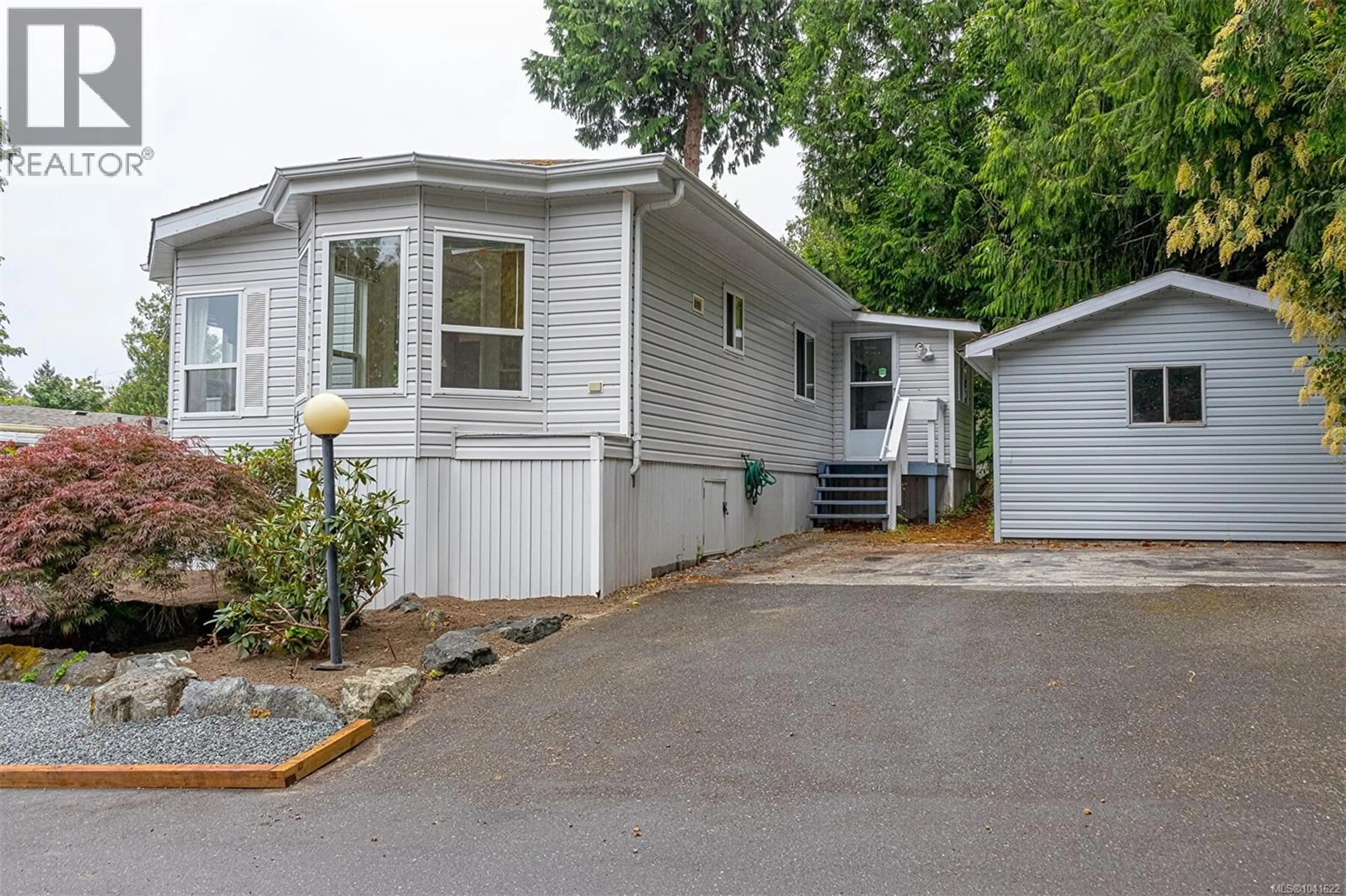 Home with vinyl exterior material, street for 613 - 2850 STAUTW ROAD, Central Saanich British Columbia V8M2C9
