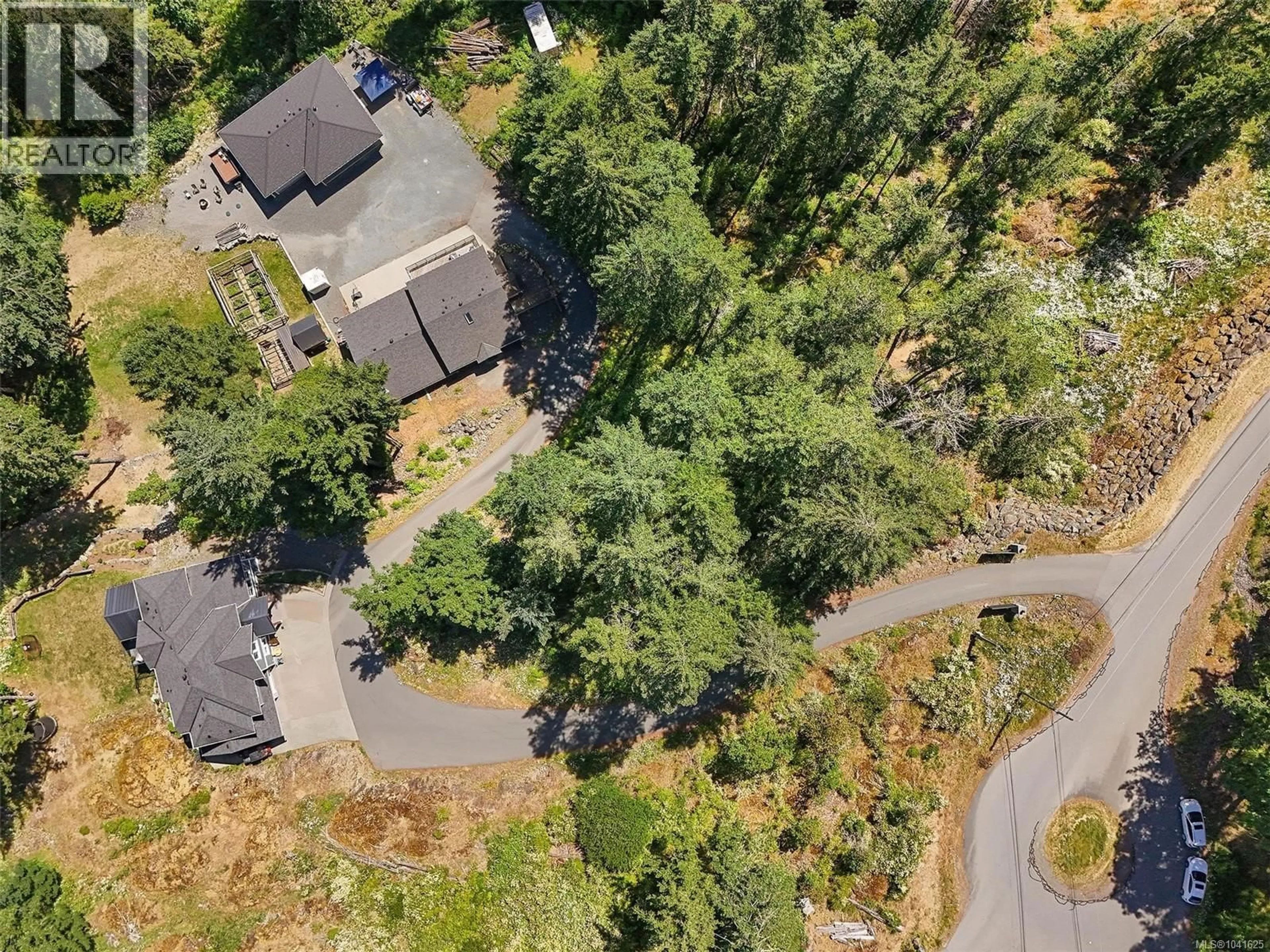 A pic from outside/outdoor area/front of a property/back of a property/a pic from drone, forest/trees view for 1789 YORK RIDGE PLACE, Highlands British Columbia V9B6E5