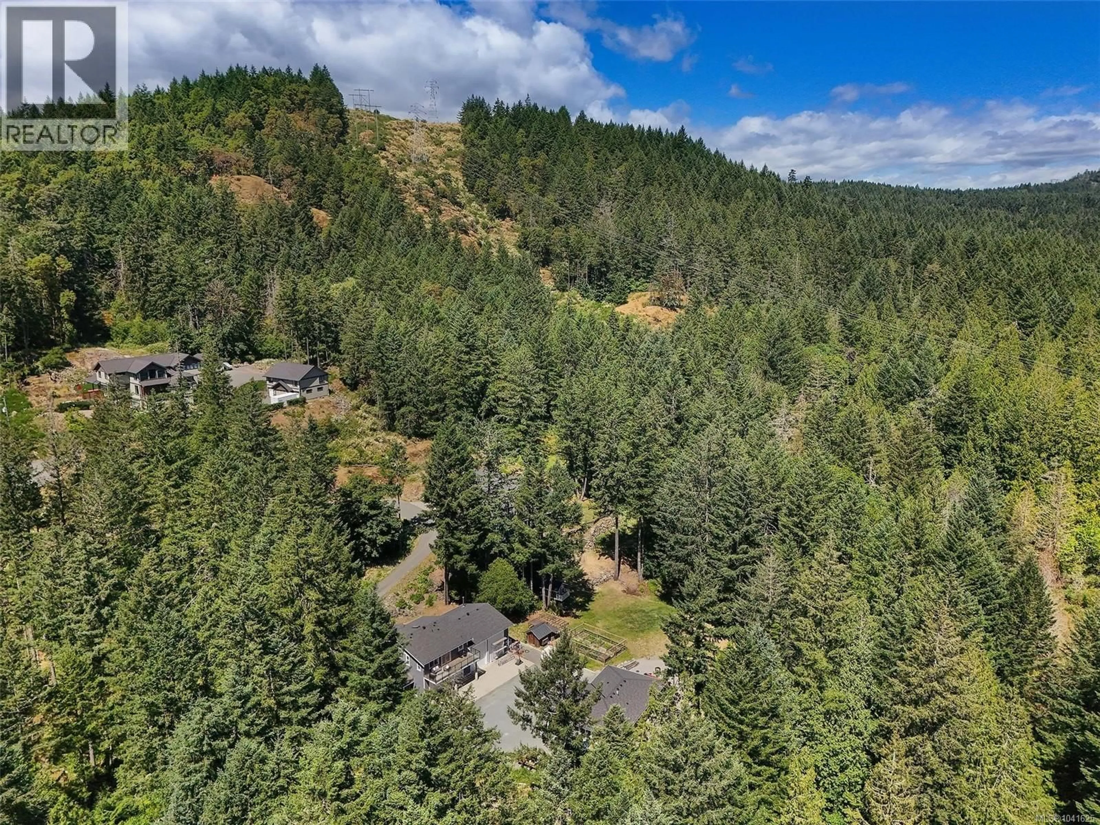 A pic from outside/outdoor area/front of a property/back of a property/a pic from drone, forest/trees view for 1789 YORK RIDGE PLACE, Highlands British Columbia V9B6E5