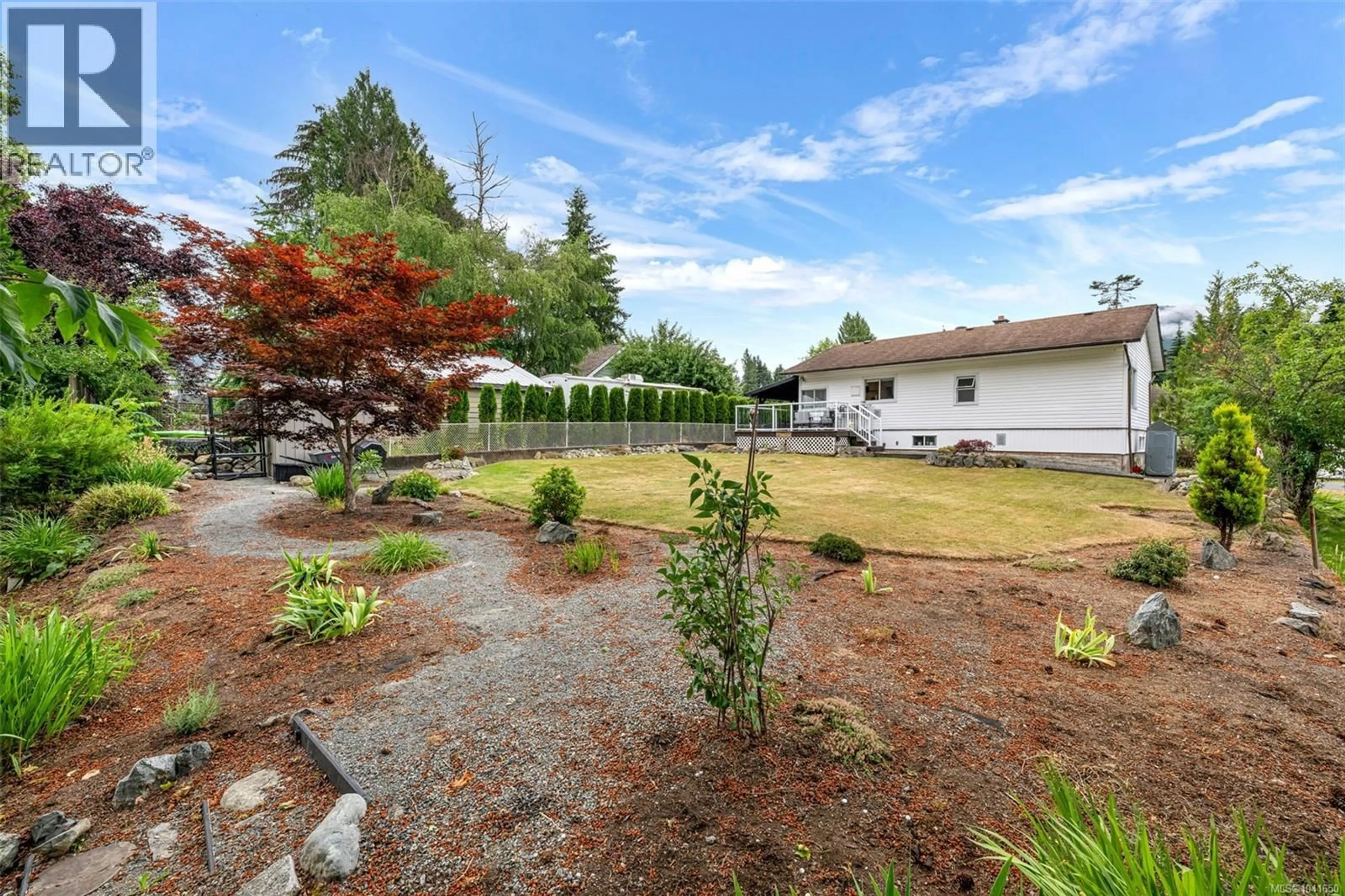 A pic from outside/outdoor area/front of a property/back of a property/a pic from drone, water/lake/river/ocean view for 105 COWICHAN AVENUE, Lake Cowichan British Columbia V0R2G0