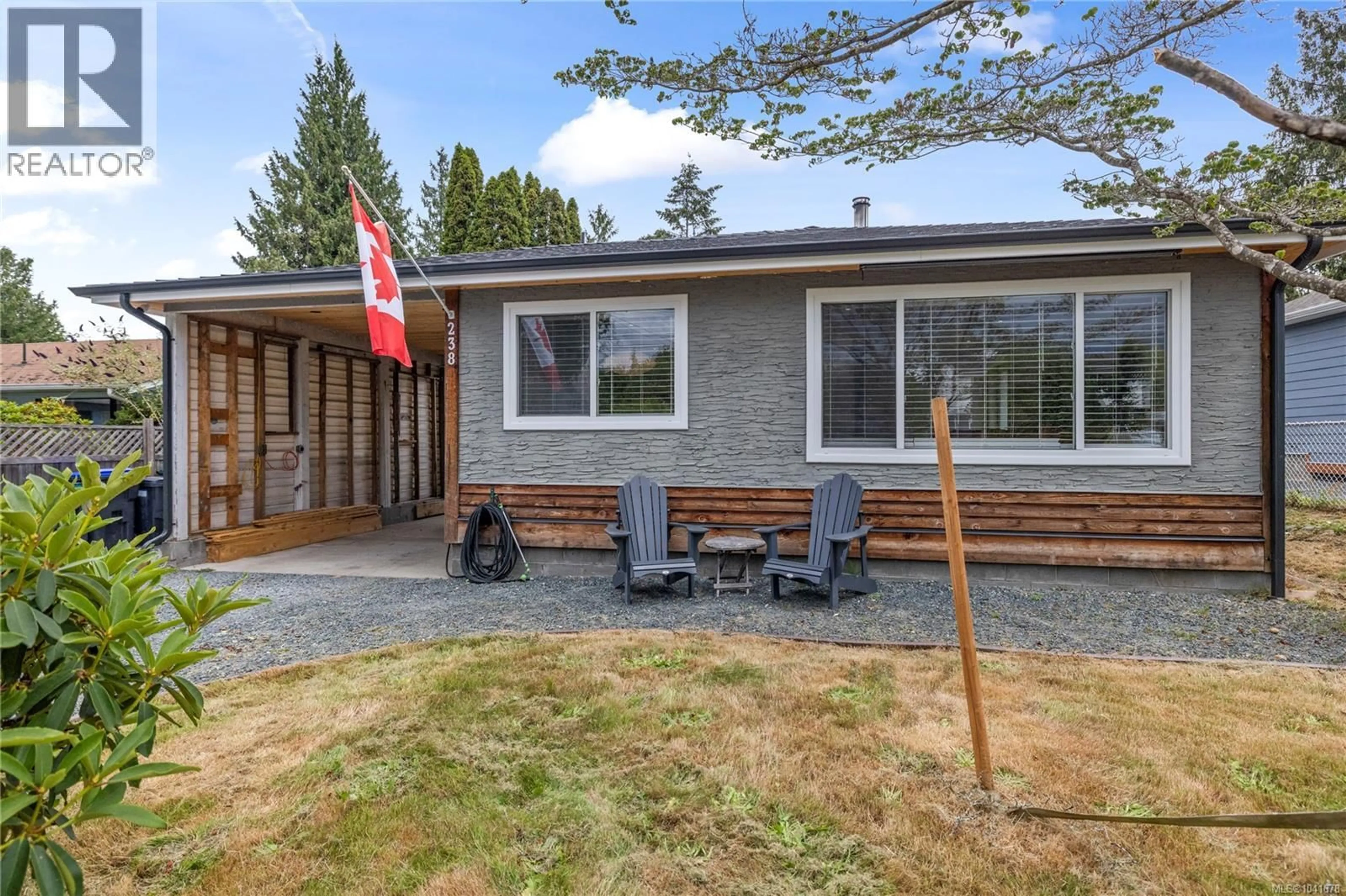 Home with vinyl exterior material, street for 238 BAGSHAW STREET, Parksville British Columbia V9P2H1
