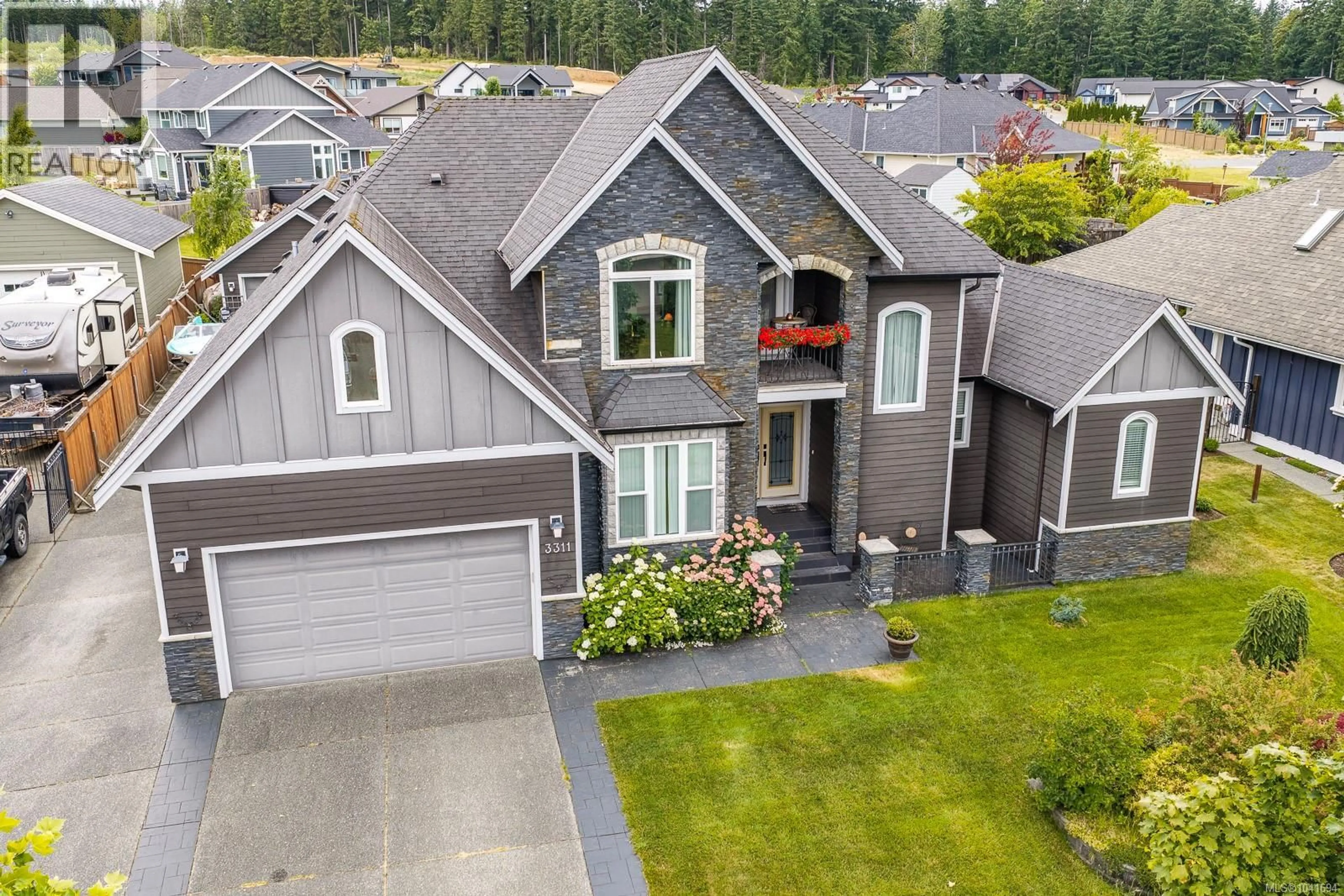 A pic from outside/outdoor area/front of a property/back of a property/a pic from drone, street for 3311 WISCONSIN WAY, Campbell River British Columbia V9H0A9