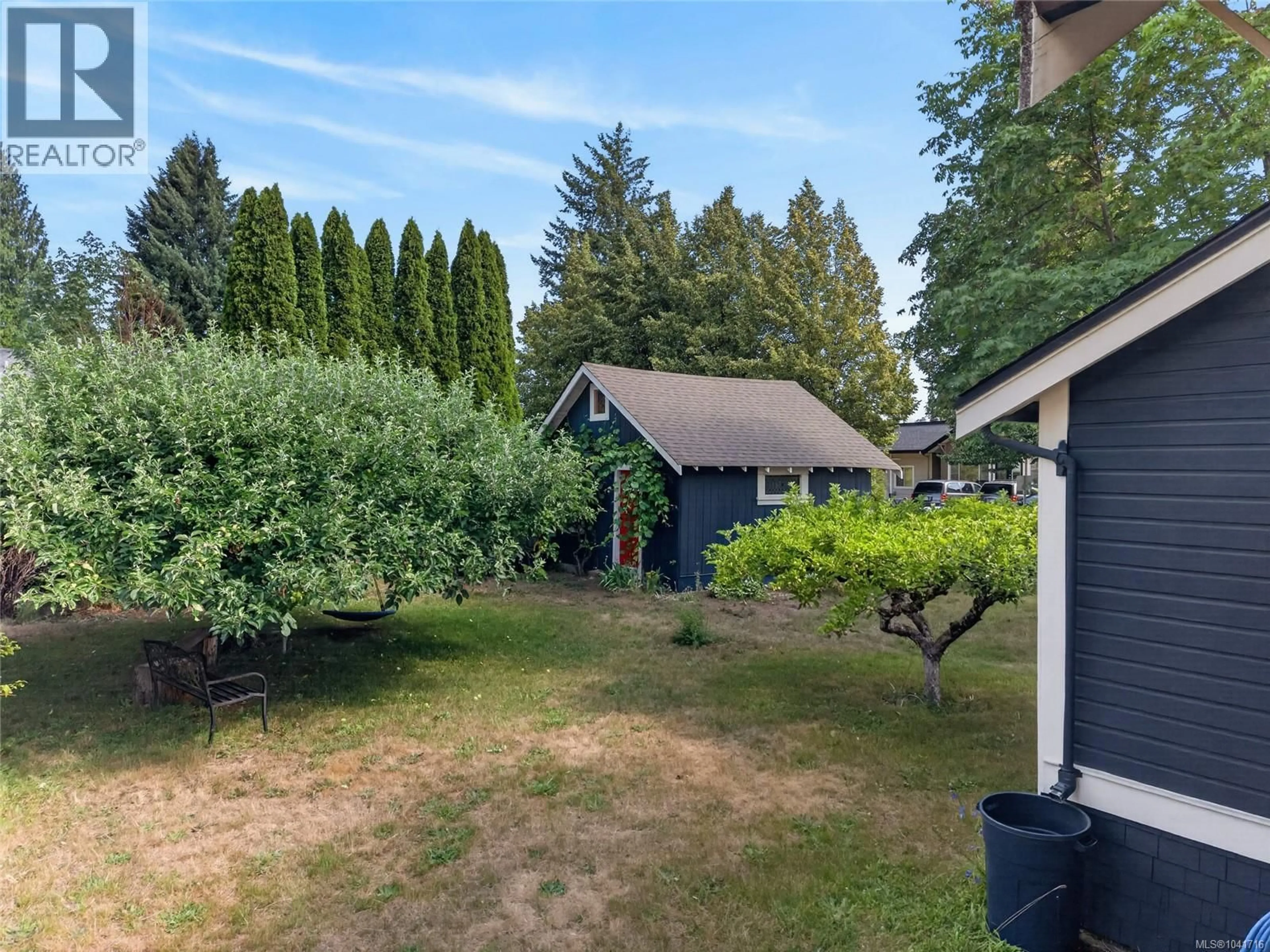 A pic from outside/outdoor area/front of a property/back of a property/a pic from drone, forest/trees view for 307 3RD STREET, Courtenay British Columbia V9N1E3