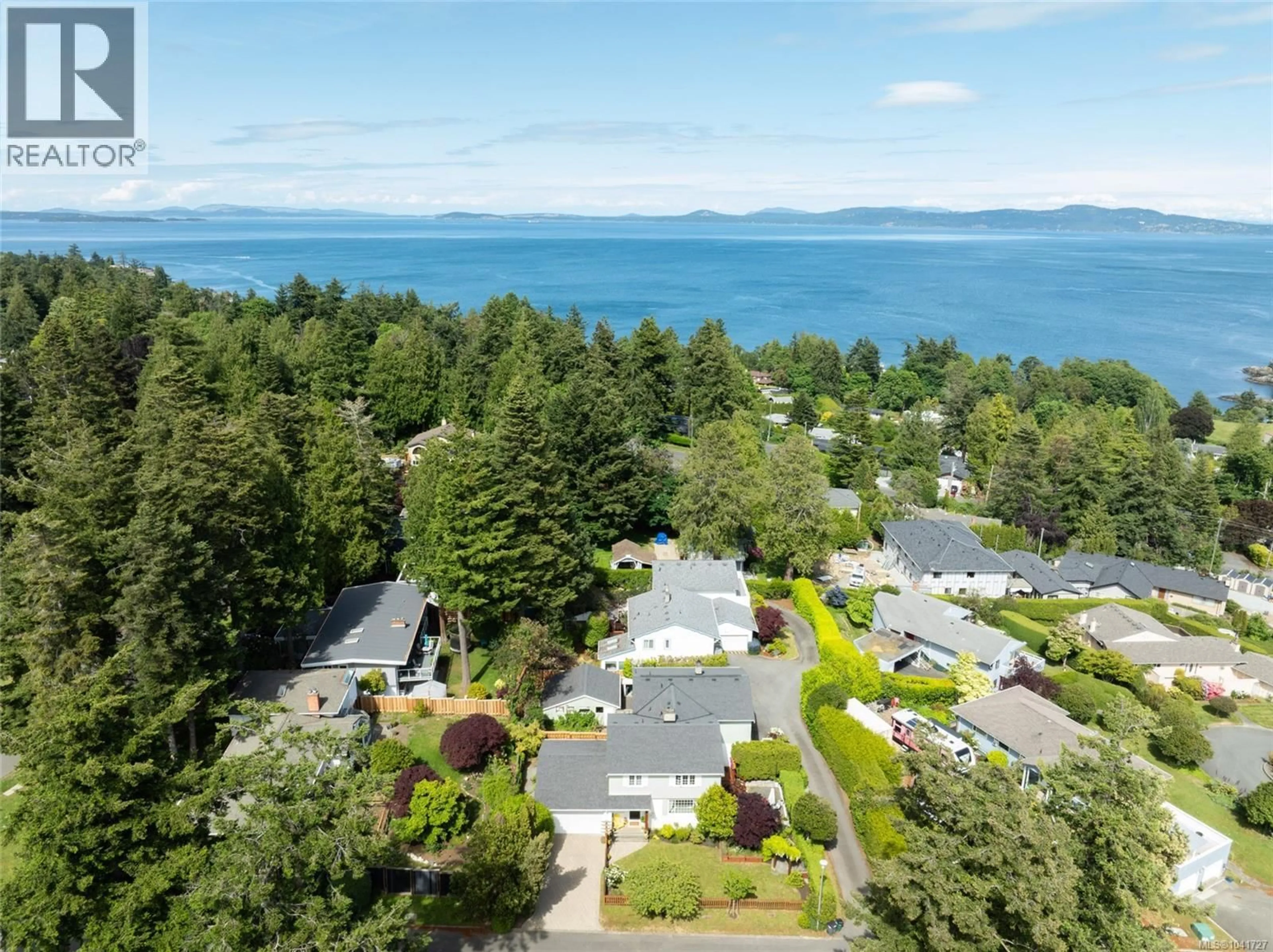 A pic from outside/outdoor area/front of a property/back of a property/a pic from drone, water/lake/river/ocean view for 2320 HOLLYHILL PLACE, Saanich British Columbia V8N1T9