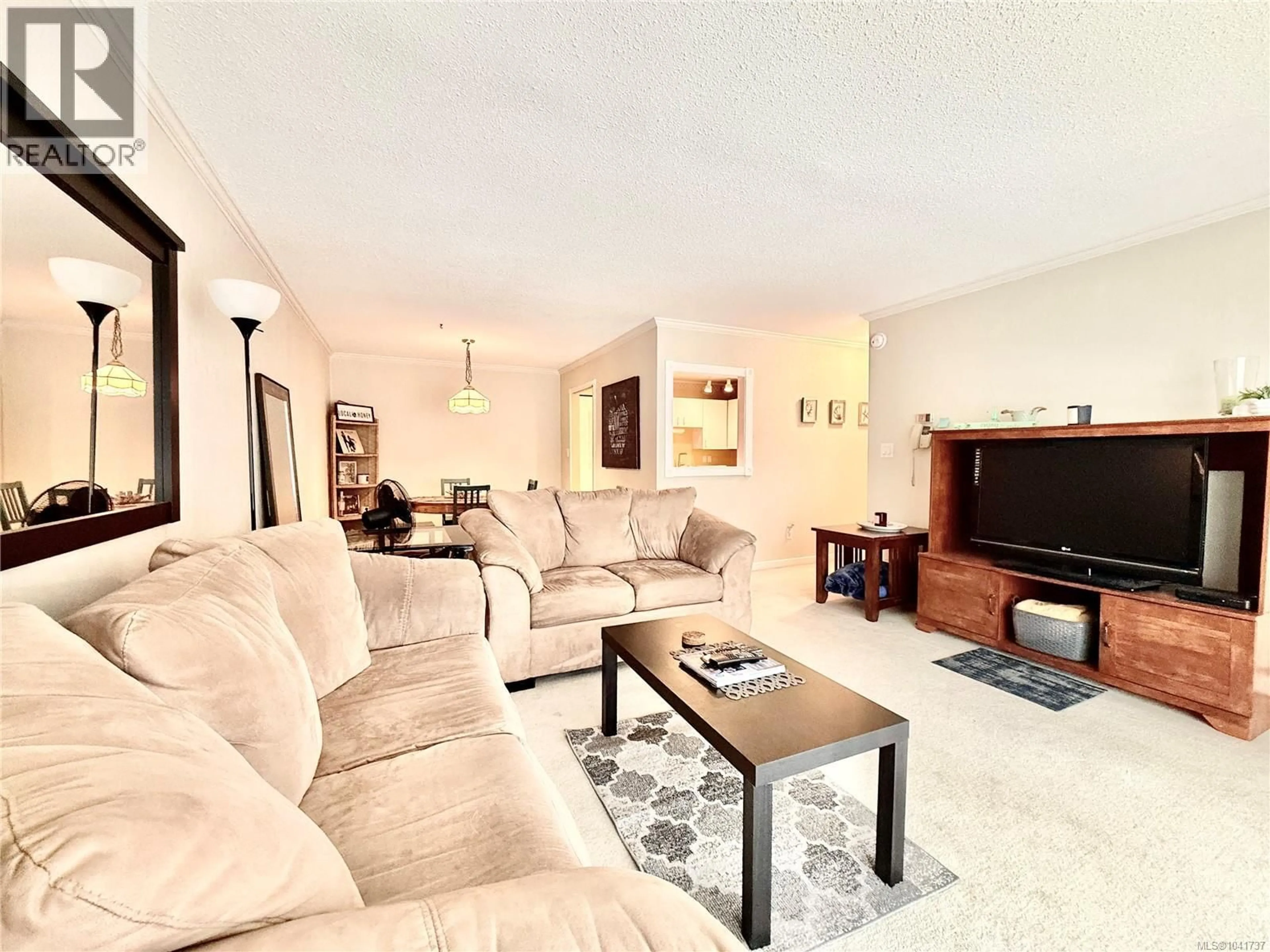 Living room with furniture, unknown for 312 - 1490 GARNET ROAD, Saanich British Columbia V8P5L1