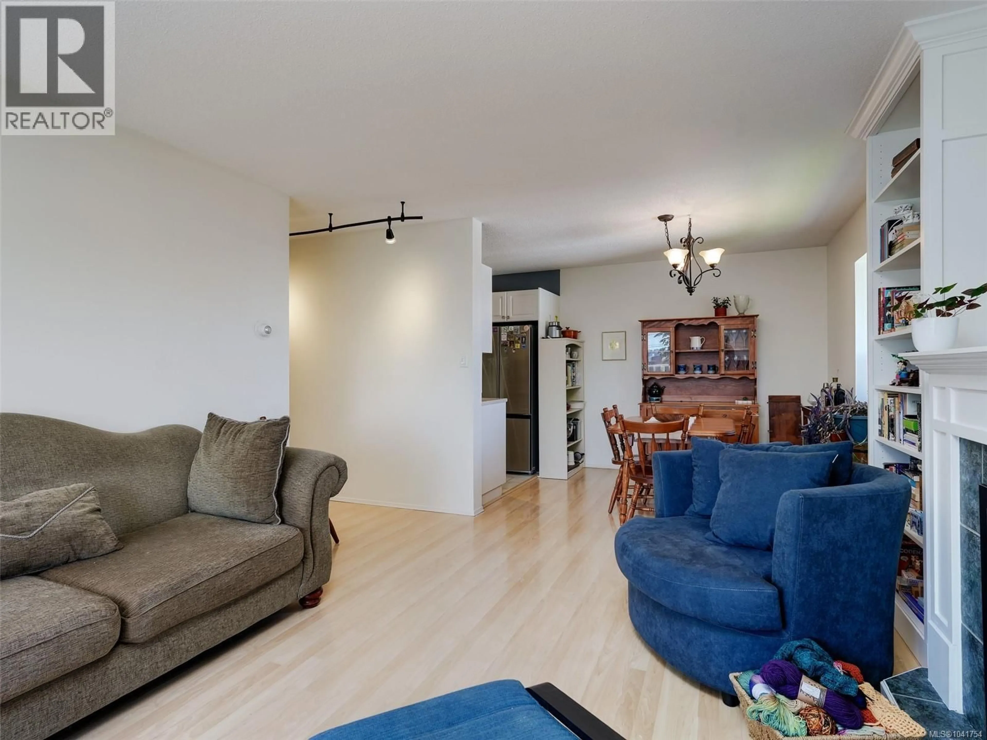 Living room with furniture, unknown for 405 - 710 LAMPSON STREET, Esquimalt British Columbia V9A6A6