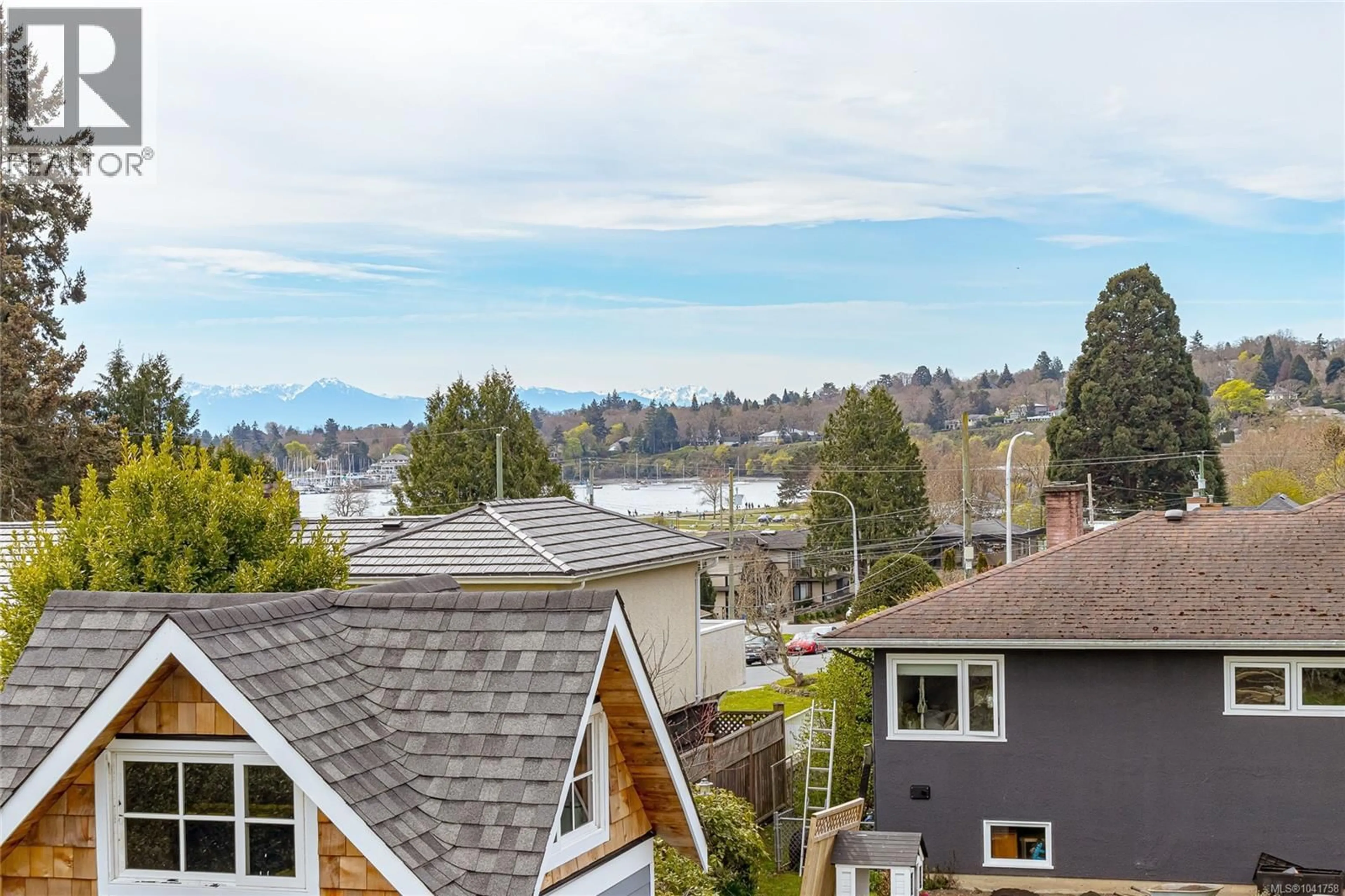 A pic from outside/outdoor area/front of a property/back of a property/a pic from drone, water/lake/river/ocean view for 3960 CHERRILEE CRESCENT, Saanich British Columbia V8N1R9