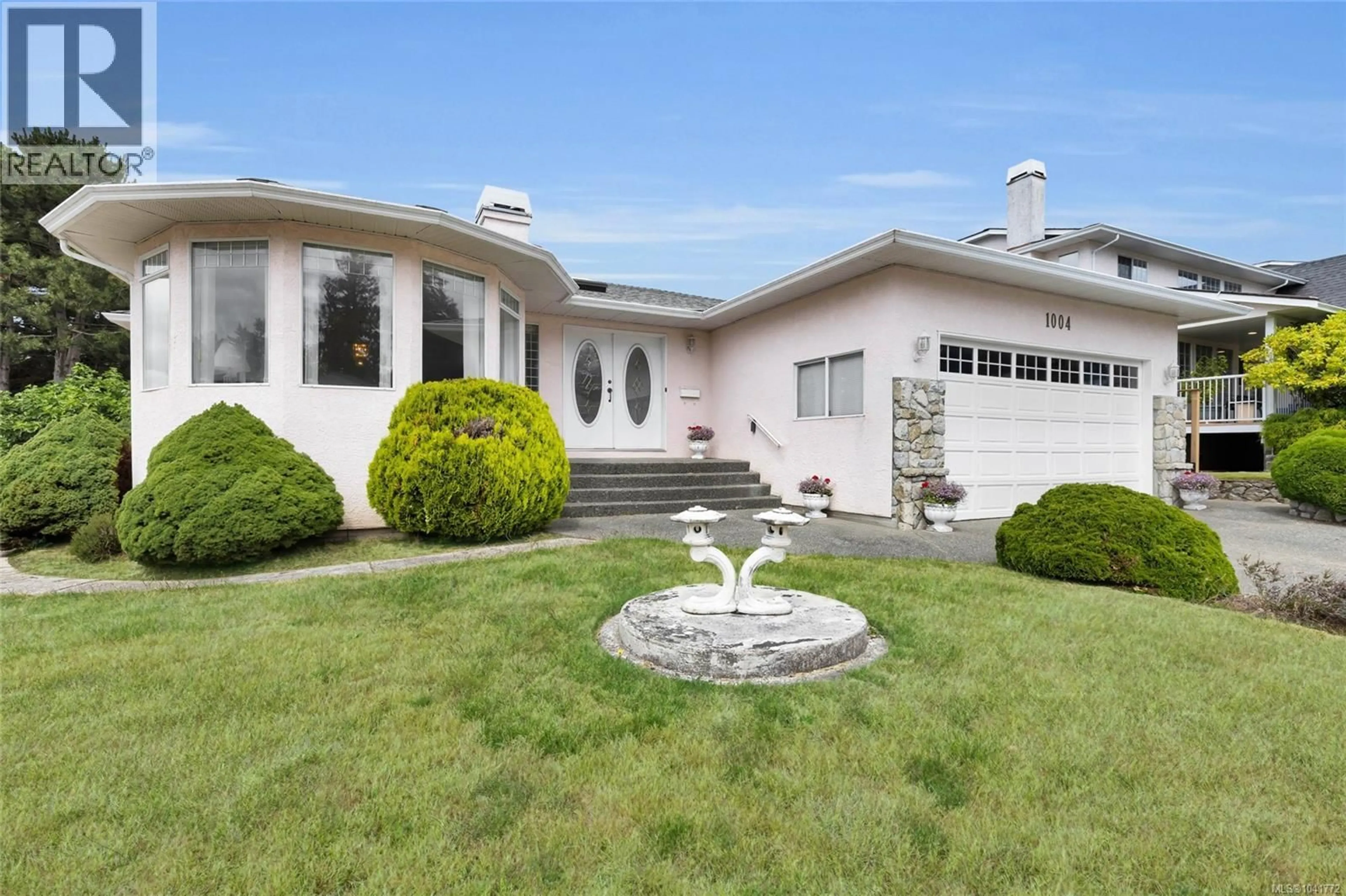 Home with vinyl exterior material, street for 1004 ADELINE PLACE, Saanich British Columbia V8Y3E7