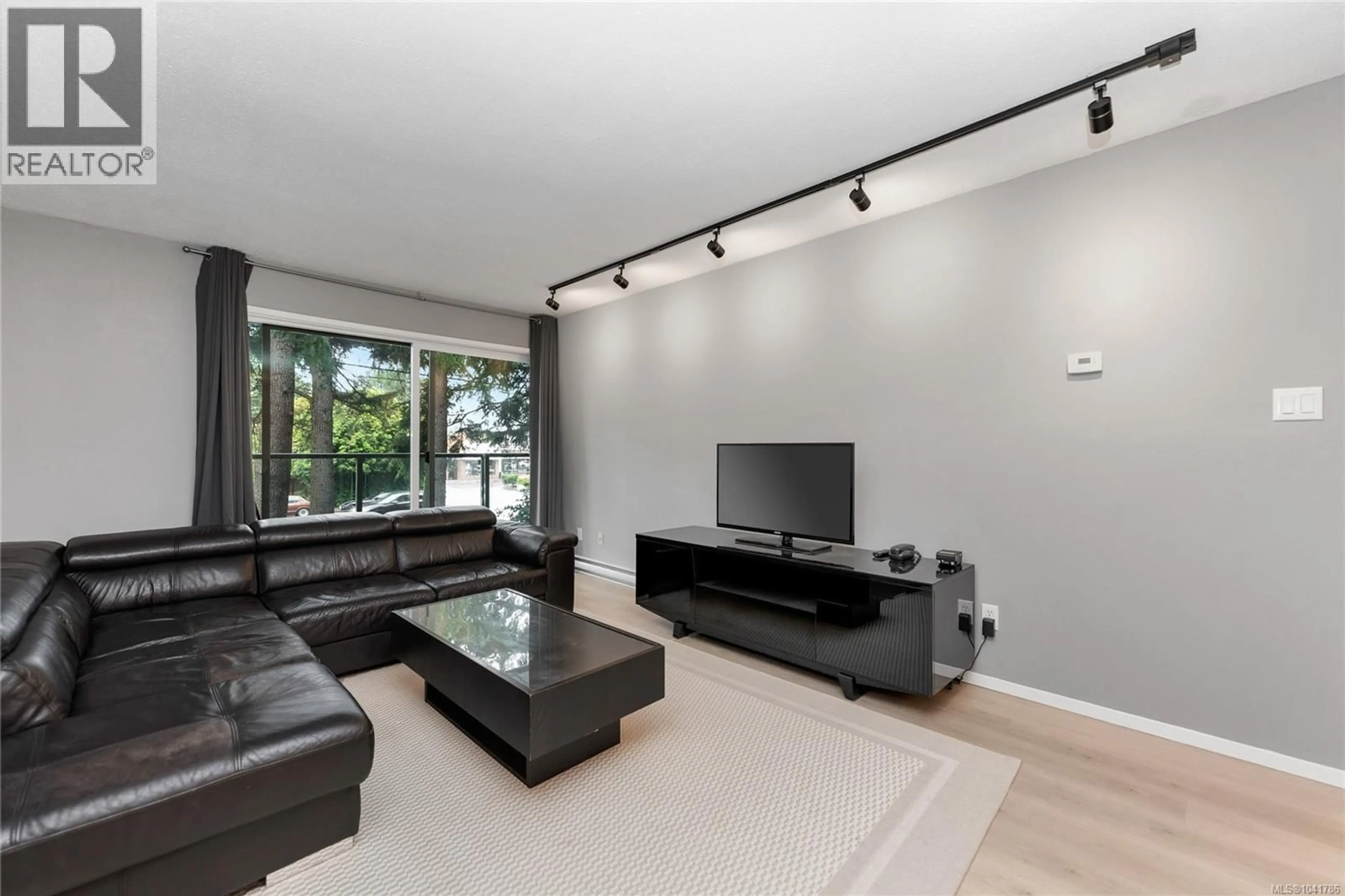 Living room with furniture, unknown for 212 - 2022 FOUL BAY ROAD, Victoria British Columbia V8R5A9