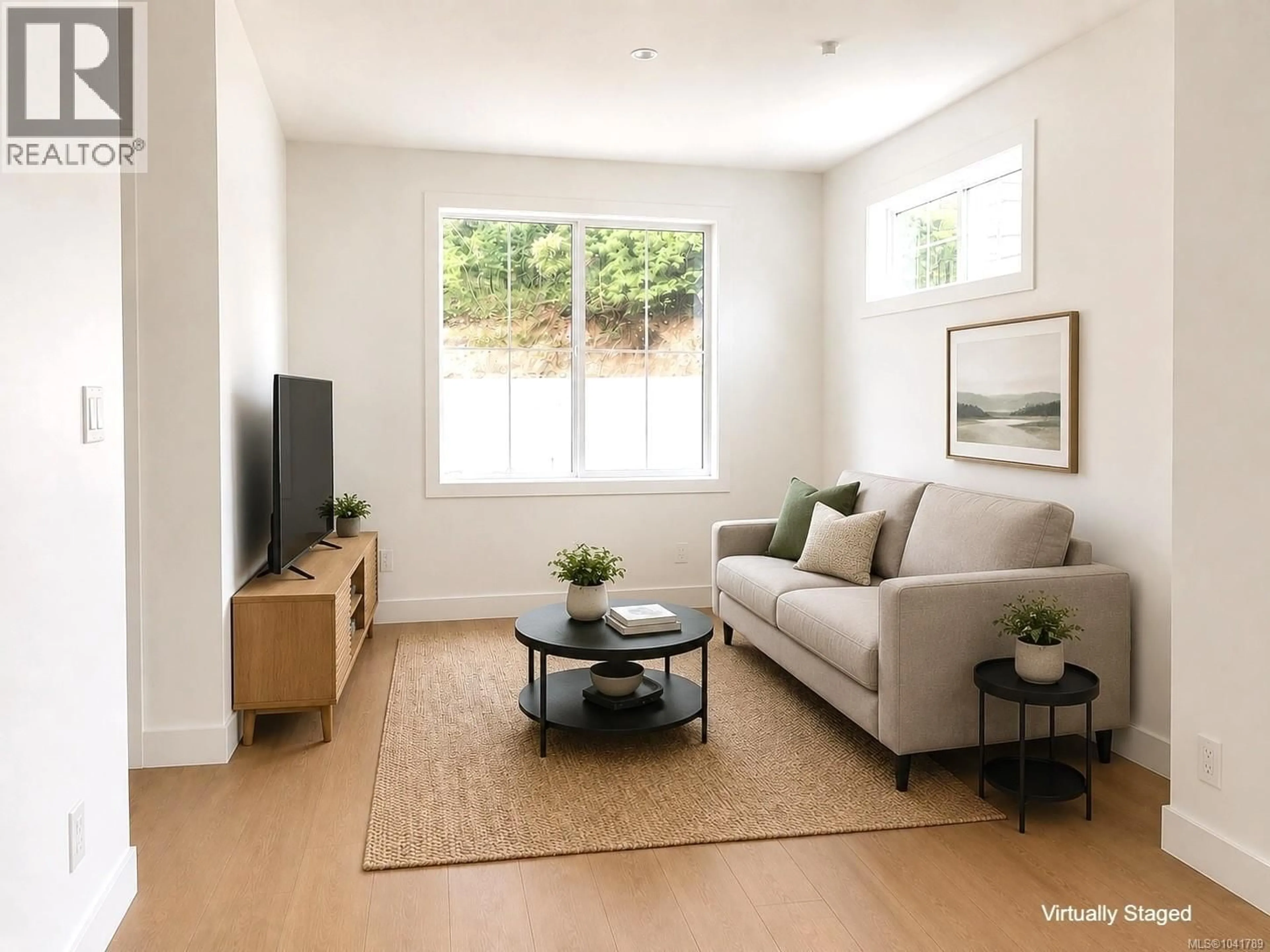 Living room with furniture, wood/laminate floor for 2 - 3439 TRUMPETER STREET, Colwood British Columbia V9C0R5