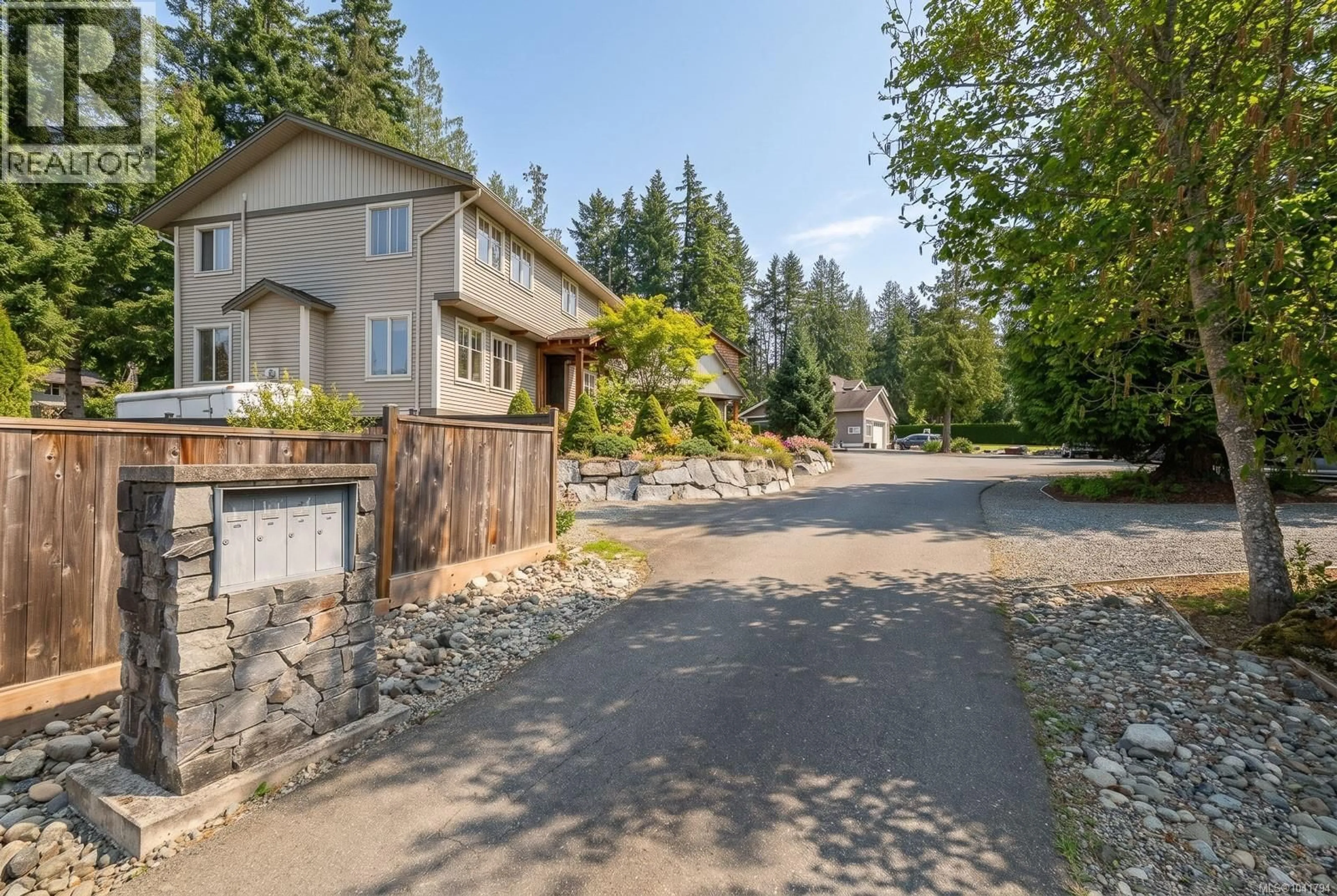 A pic from outside/outdoor area/front of a property/back of a property/a pic from drone, unknown for 2445 CRYSTAL BROOK WAY, Nanaimo British Columbia V9T6L5