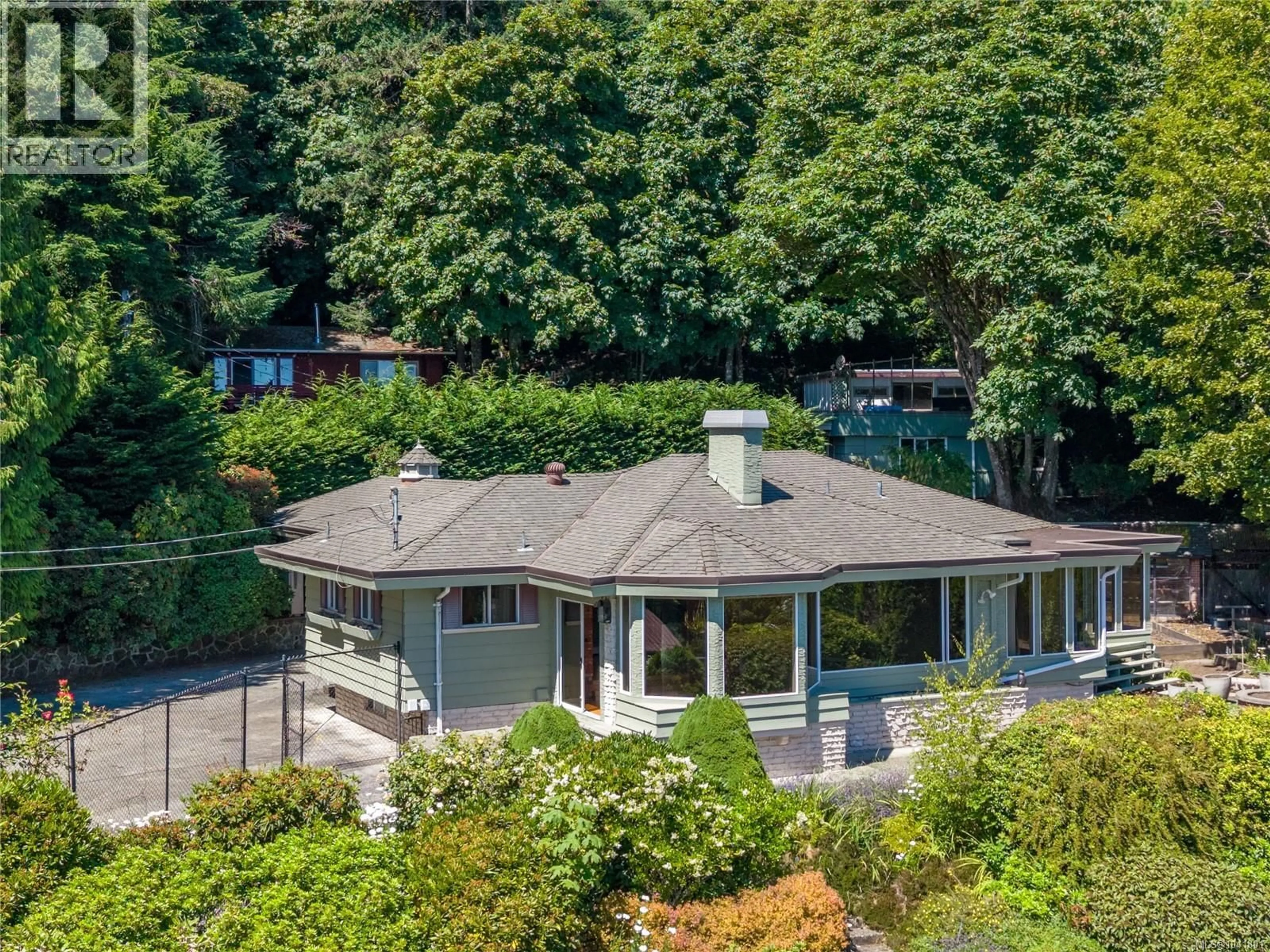 A pic from outside/outdoor area/front of a property/back of a property/a pic from drone, water/lake/river/ocean view for 4916 LOCHSIDE DRIVE, Saanich British Columbia V8Y2E4