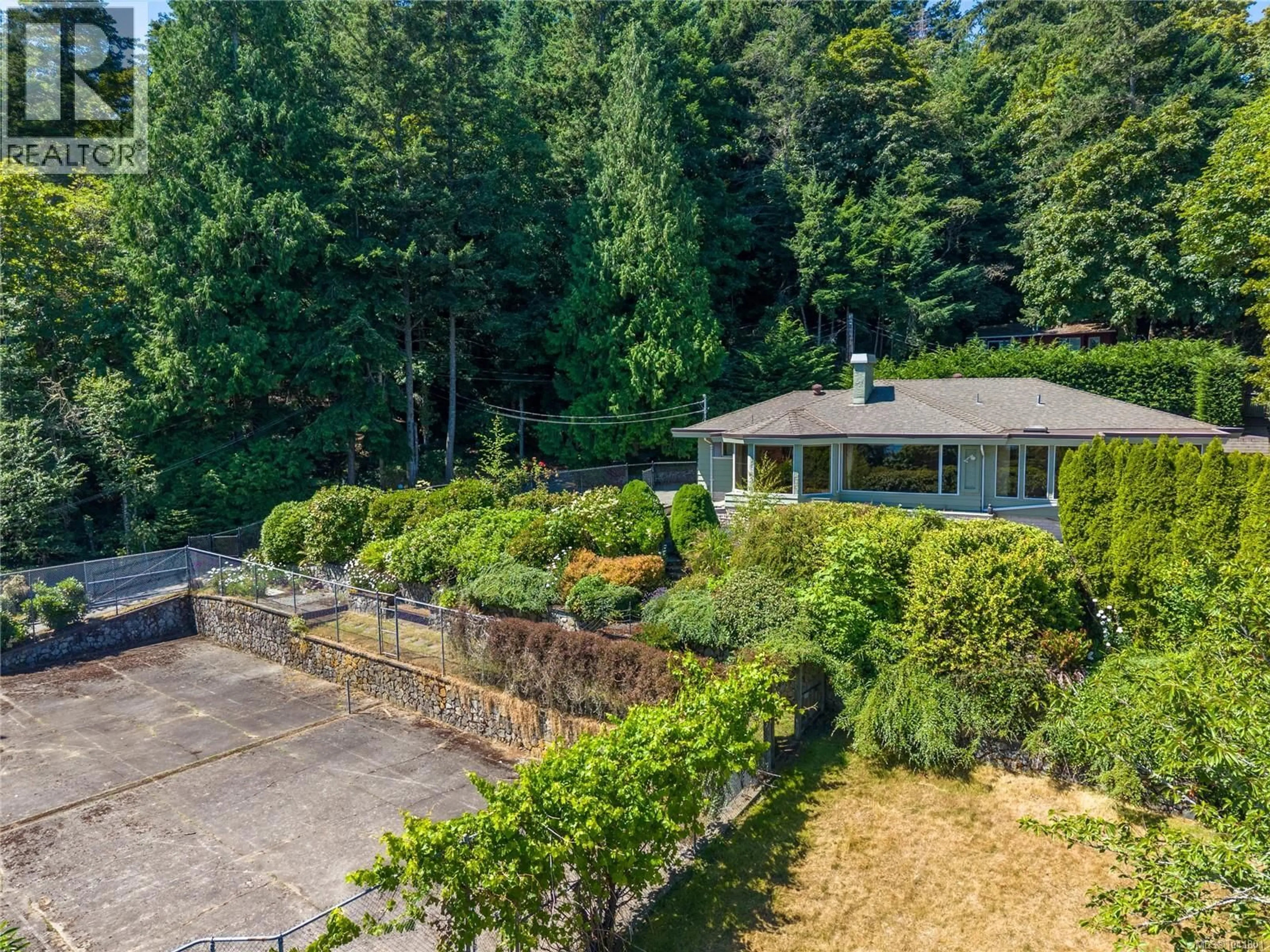 A pic from outside/outdoor area/front of a property/back of a property/a pic from drone, unknown for 4916 LOCHSIDE DRIVE, Saanich British Columbia V8Y2E4