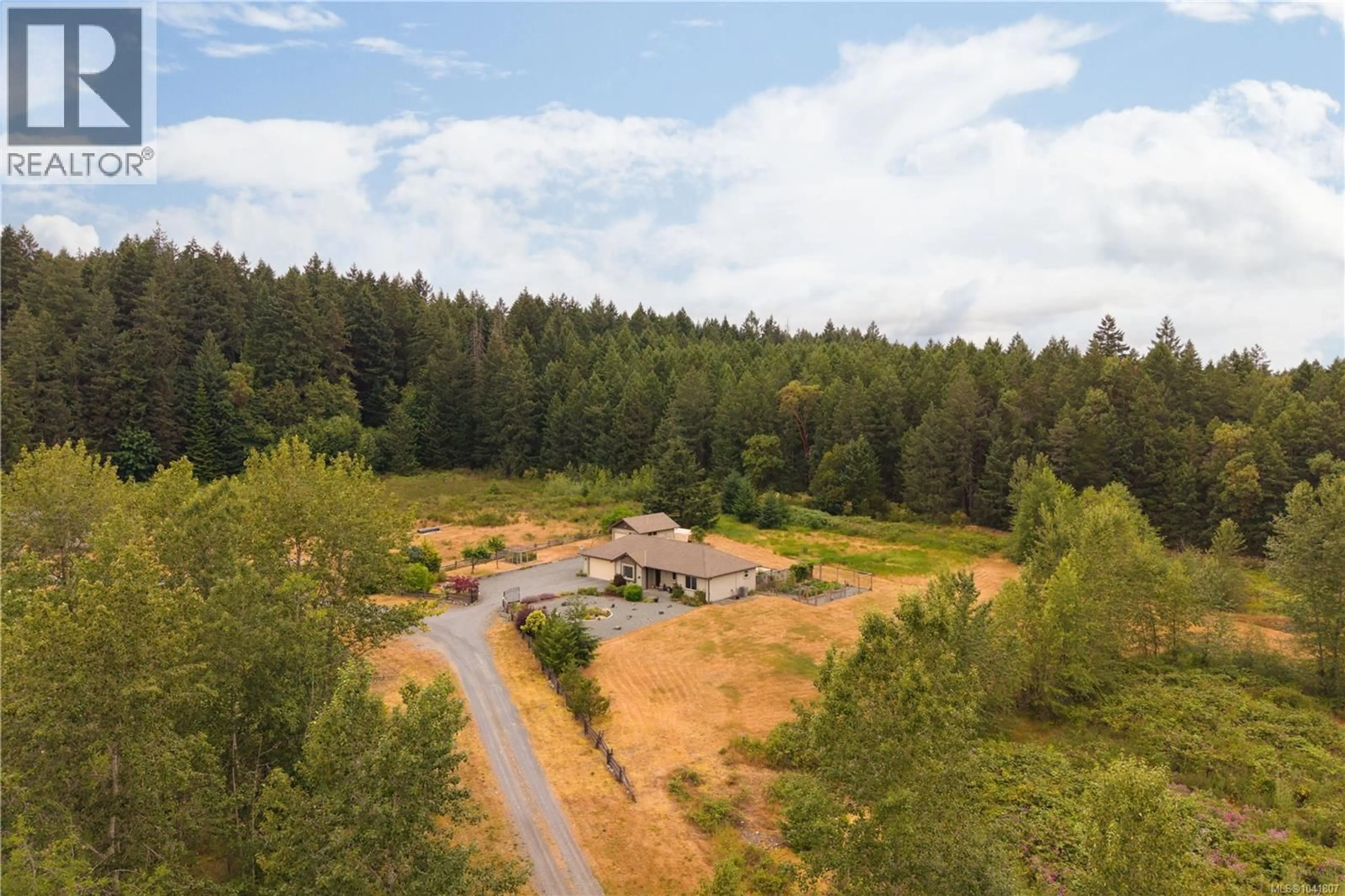 A pic from outside/outdoor area/front of a property/back of a property/a pic from drone, forest/trees view for 460 NANAIMO RIVER ROAD, Nanaimo British Columbia V9X1E2