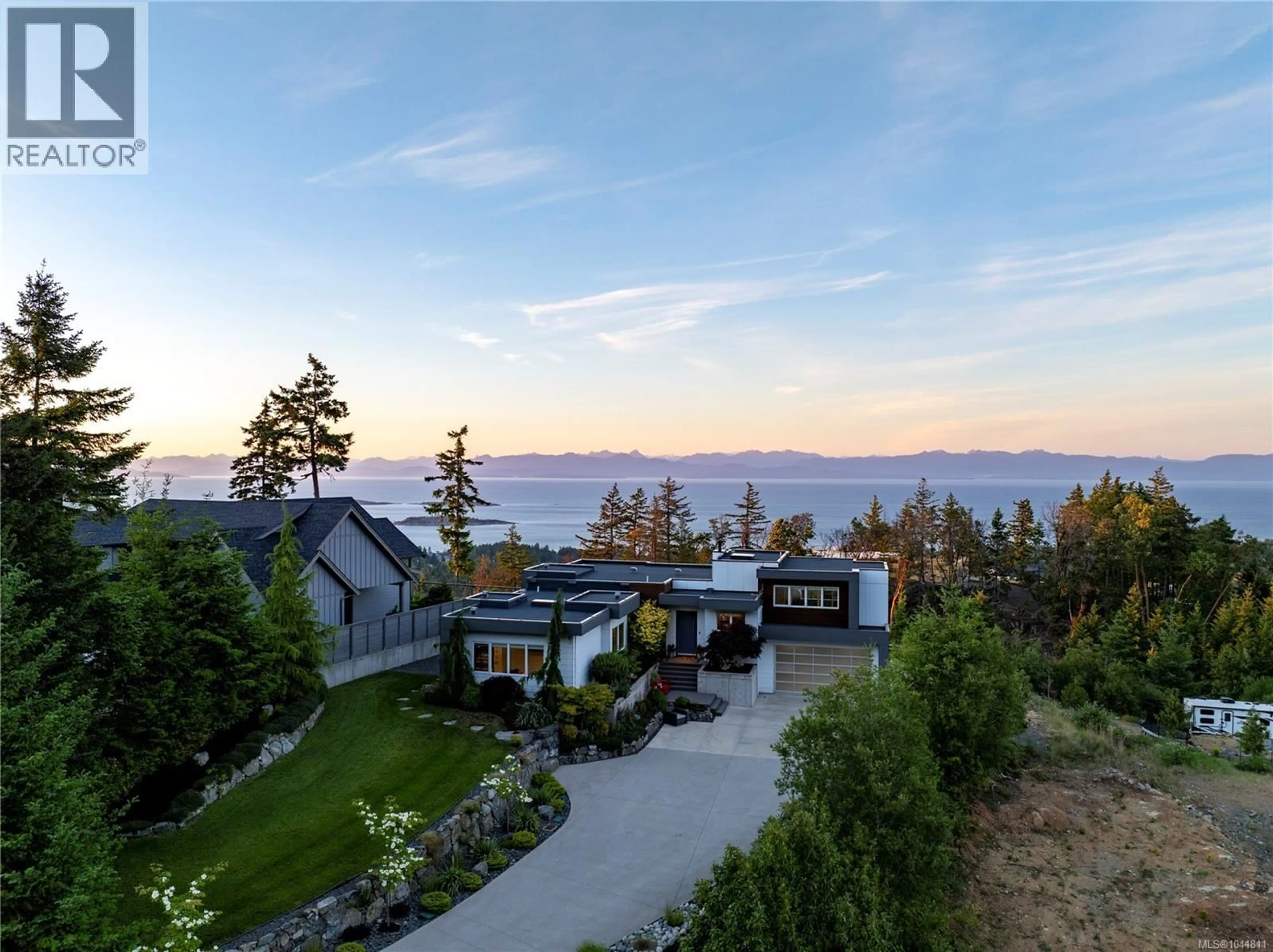 A pic from outside/outdoor area/front of a property/back of a property/a pic from drone, mountain view for 7482 COPLEY RIDGE DRIVE, Lantzville British Columbia V0R2H0