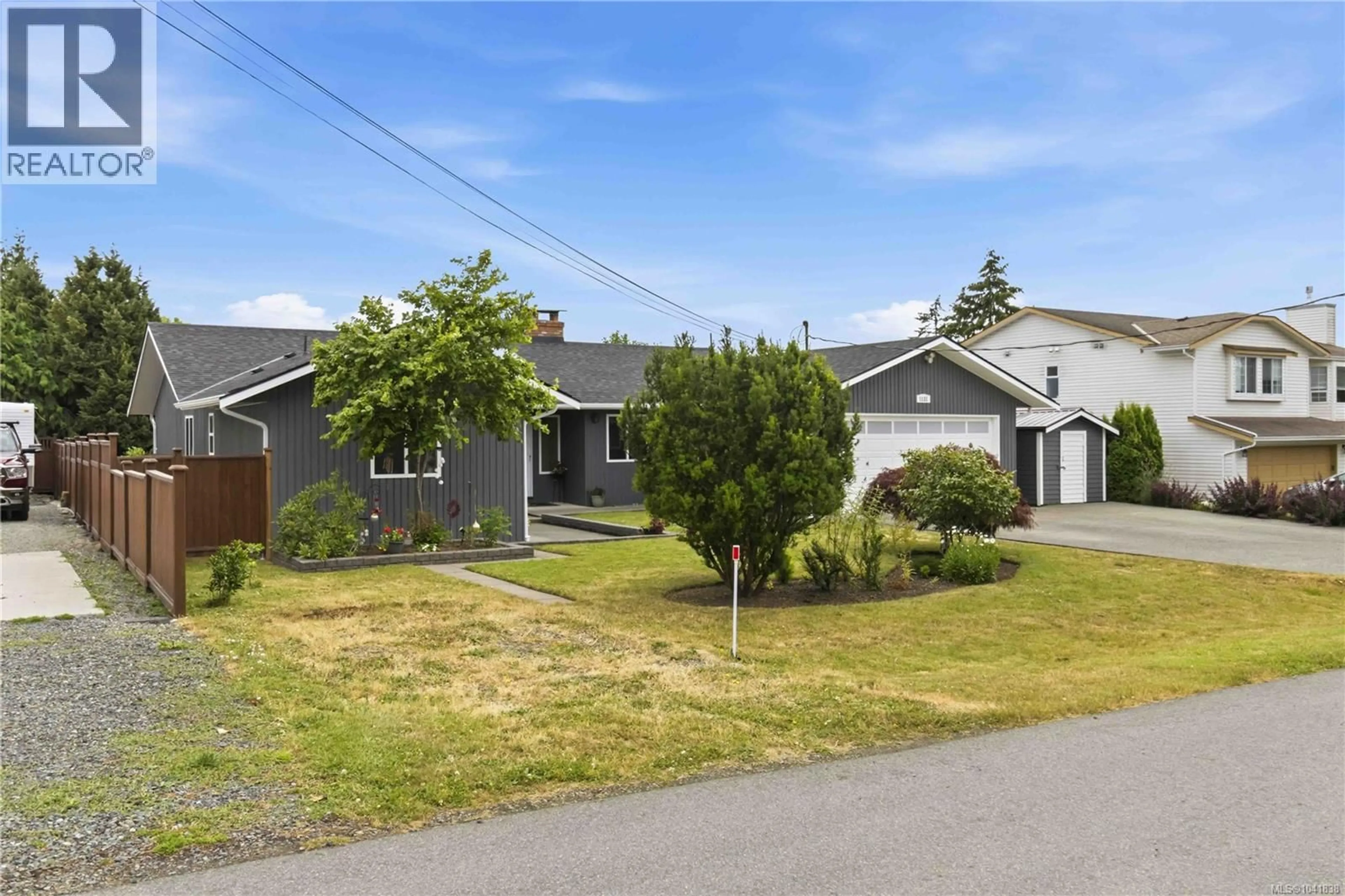 A pic from outside/outdoor area/front of a property/back of a property/a pic from drone, street for 1131 HOLLY PARK ROAD, Central Saanich British Columbia V8M1E6