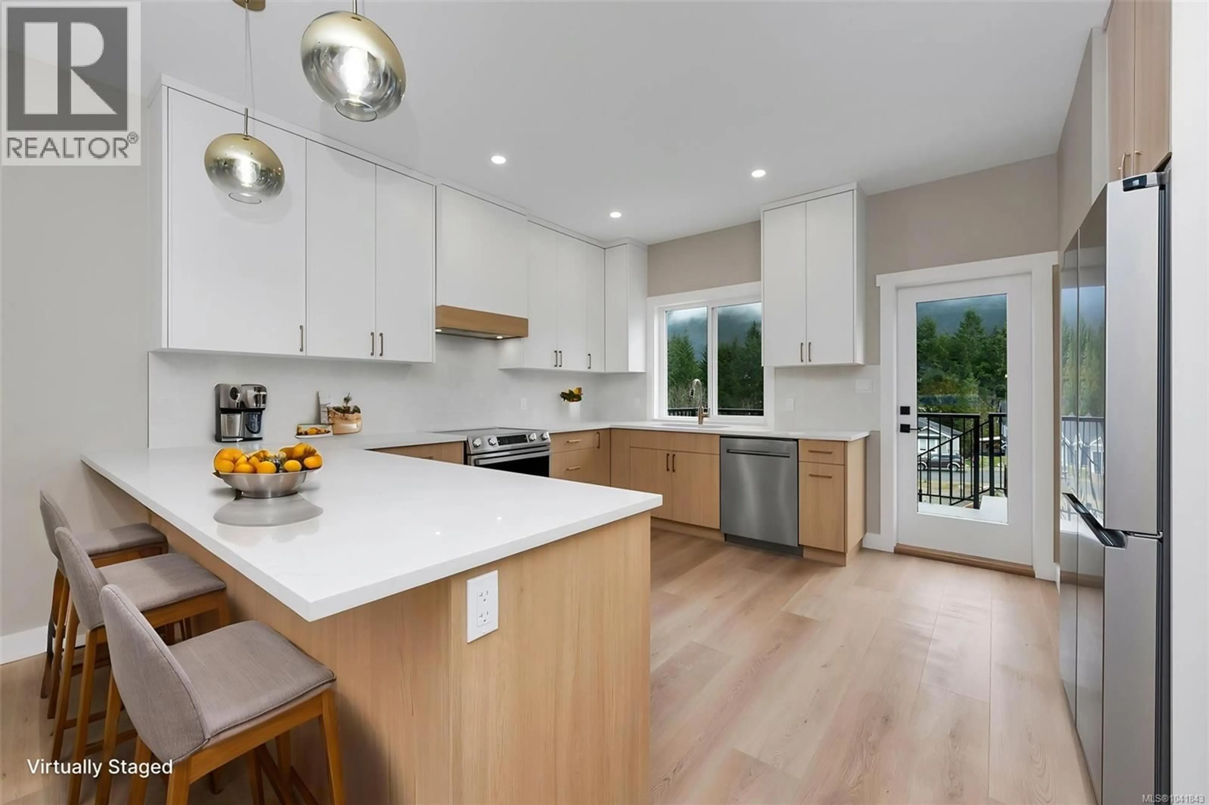 Open concept kitchen, wood/laminate floor for 155 MAPLEWOOD RISE, Lake Cowichan British Columbia V0R2G0