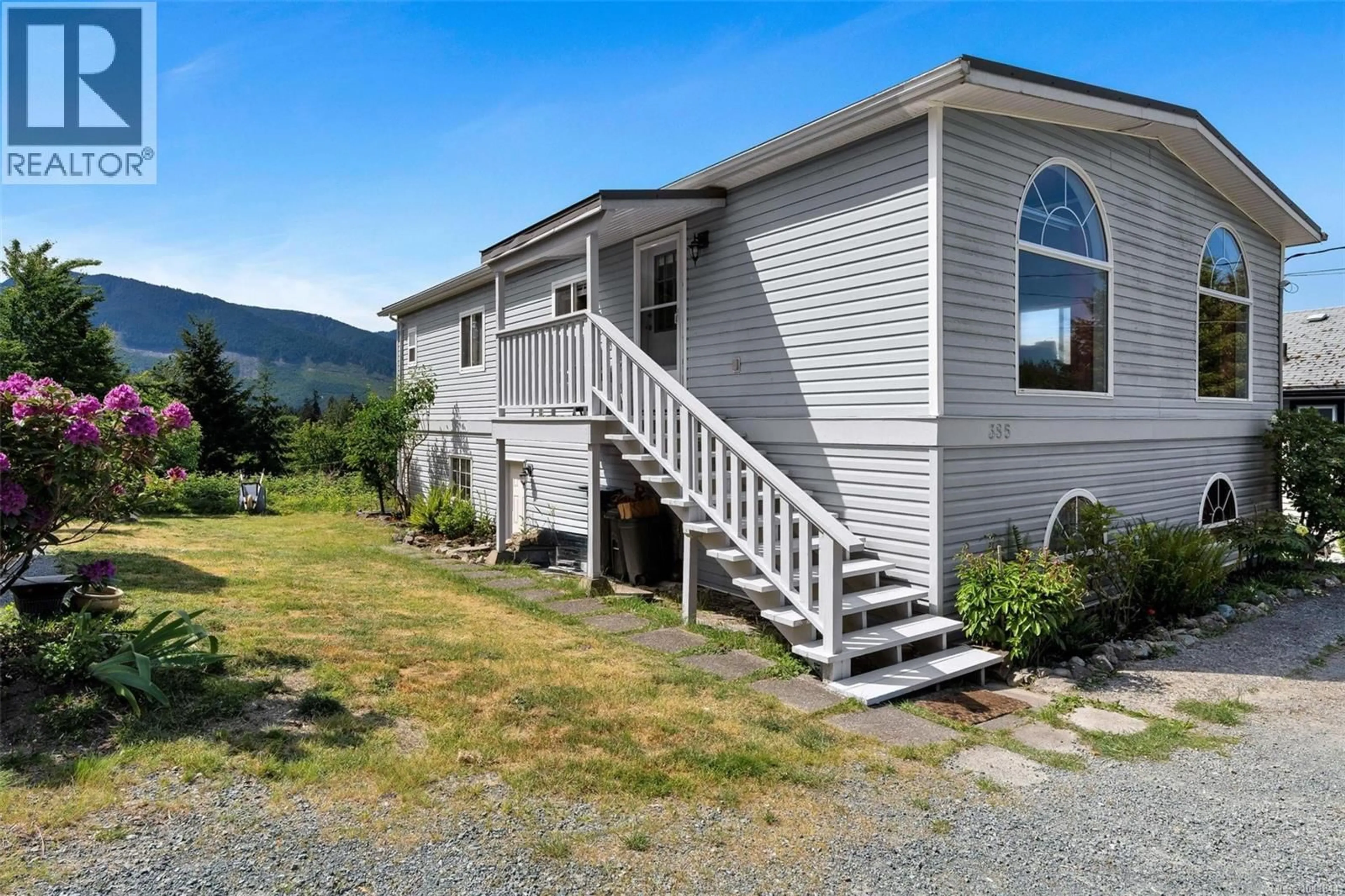 Home with vinyl exterior material, mountain view for 385 LAKE PARK ROAD, Lake Cowichan British Columbia V0N2L0
