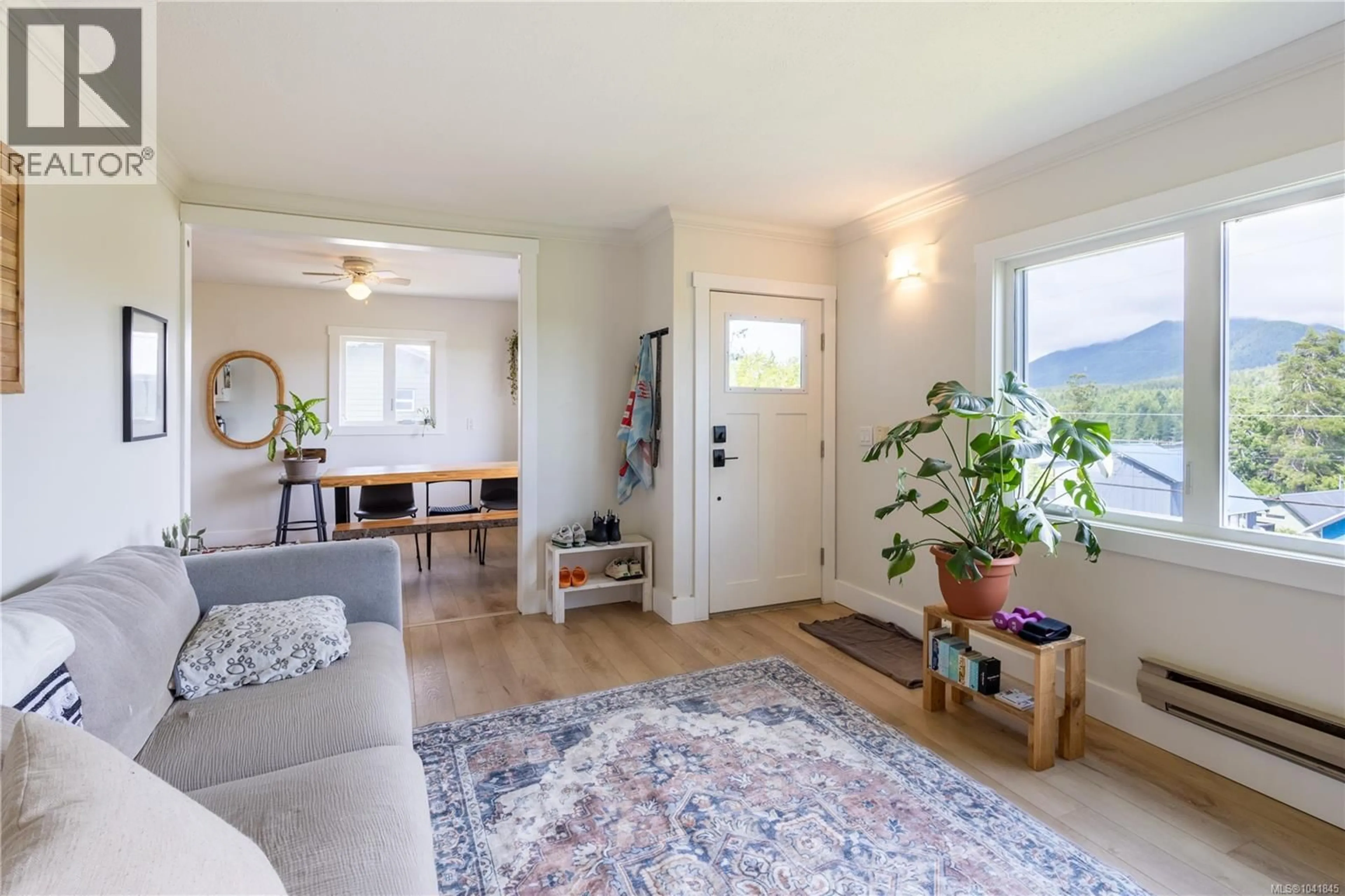 Living room with furniture, wood/laminate floor for 1350 HELEN ROAD, Ucluelet British Columbia V0R3A0
