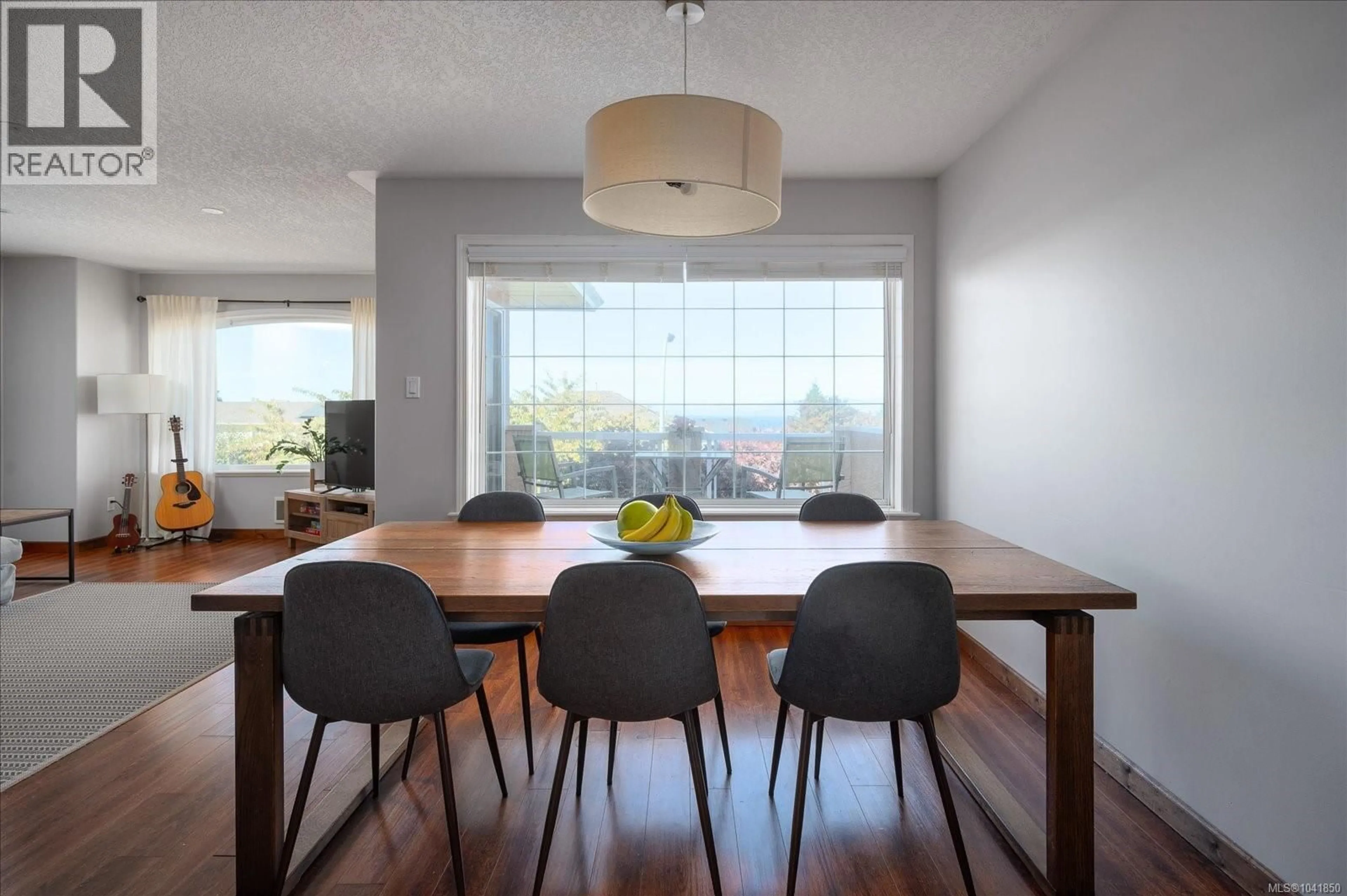 Dining room, wood/laminate floor for 6427 NIDRI PLACE, Nanaimo British Columbia V9V1N6