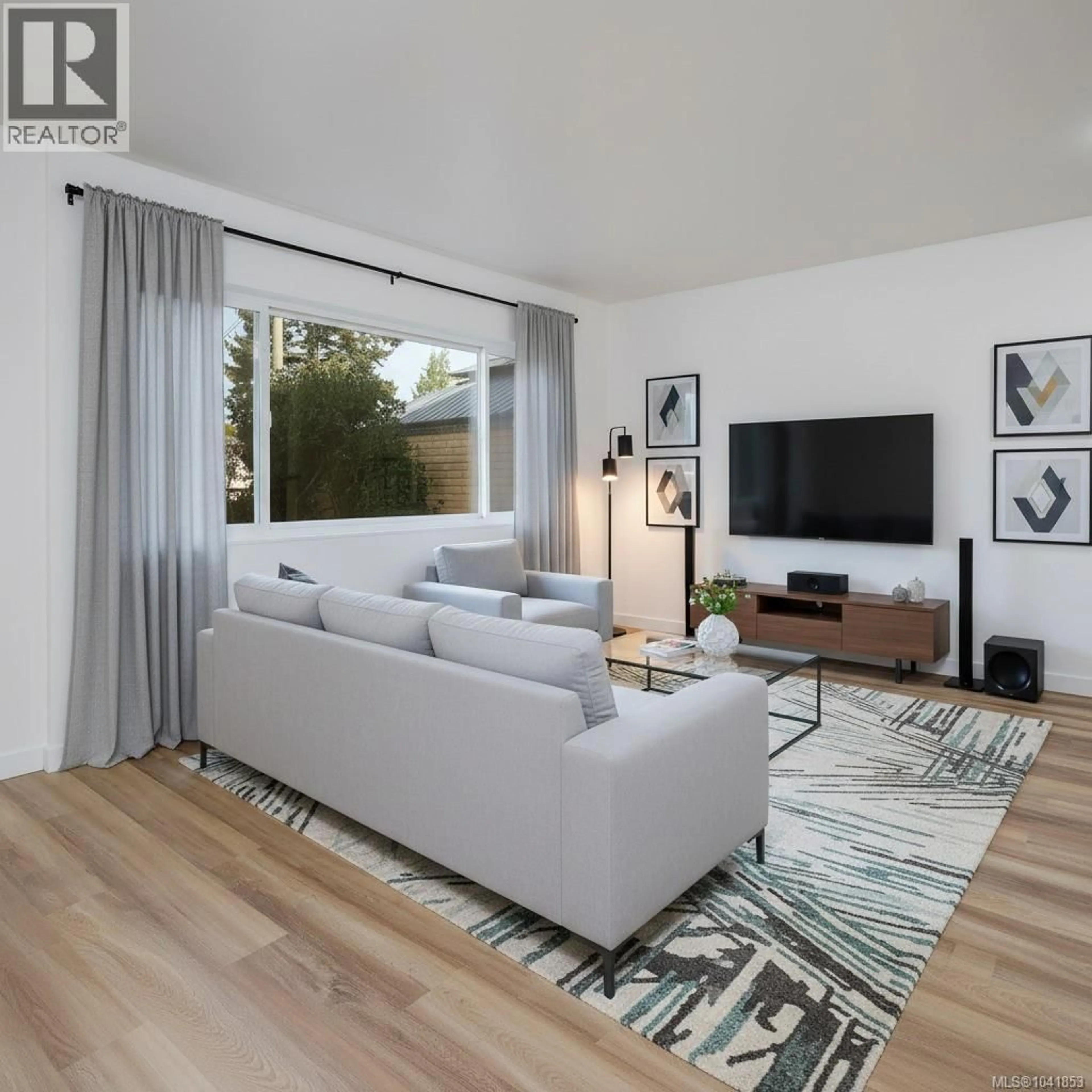 Living room with furniture, wood/laminate floor for 4 - 740 WILSON STREET, Victoria British Columbia V9A3H2