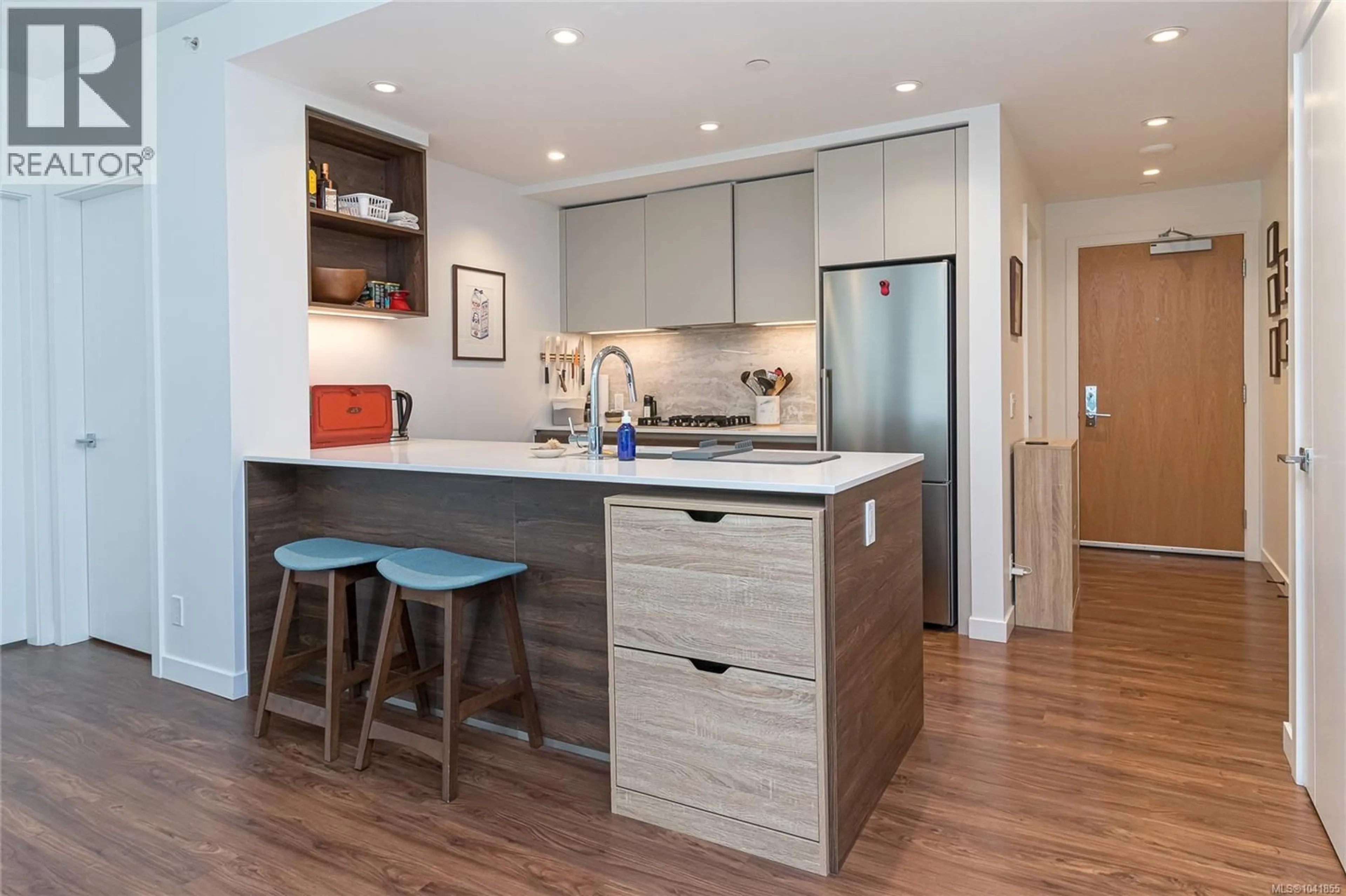 Contemporary kitchen, wood/laminate floor for 505 - 369 TYEE ROAD, Victoria British Columbia V9A0B6