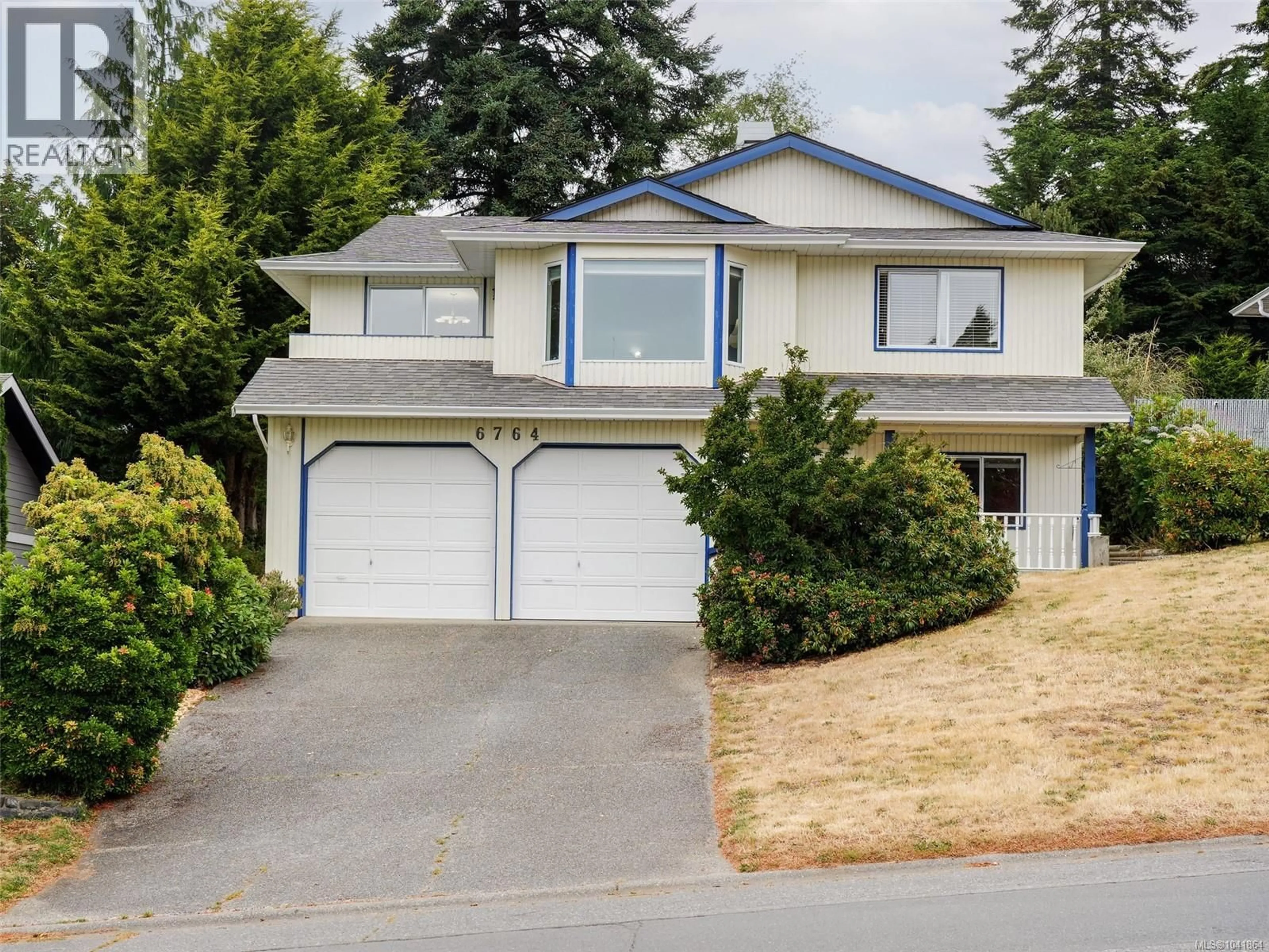 Home with vinyl exterior material, street for 6764 RHODONITE DRIVE, Sooke British Columbia V9Z0H5