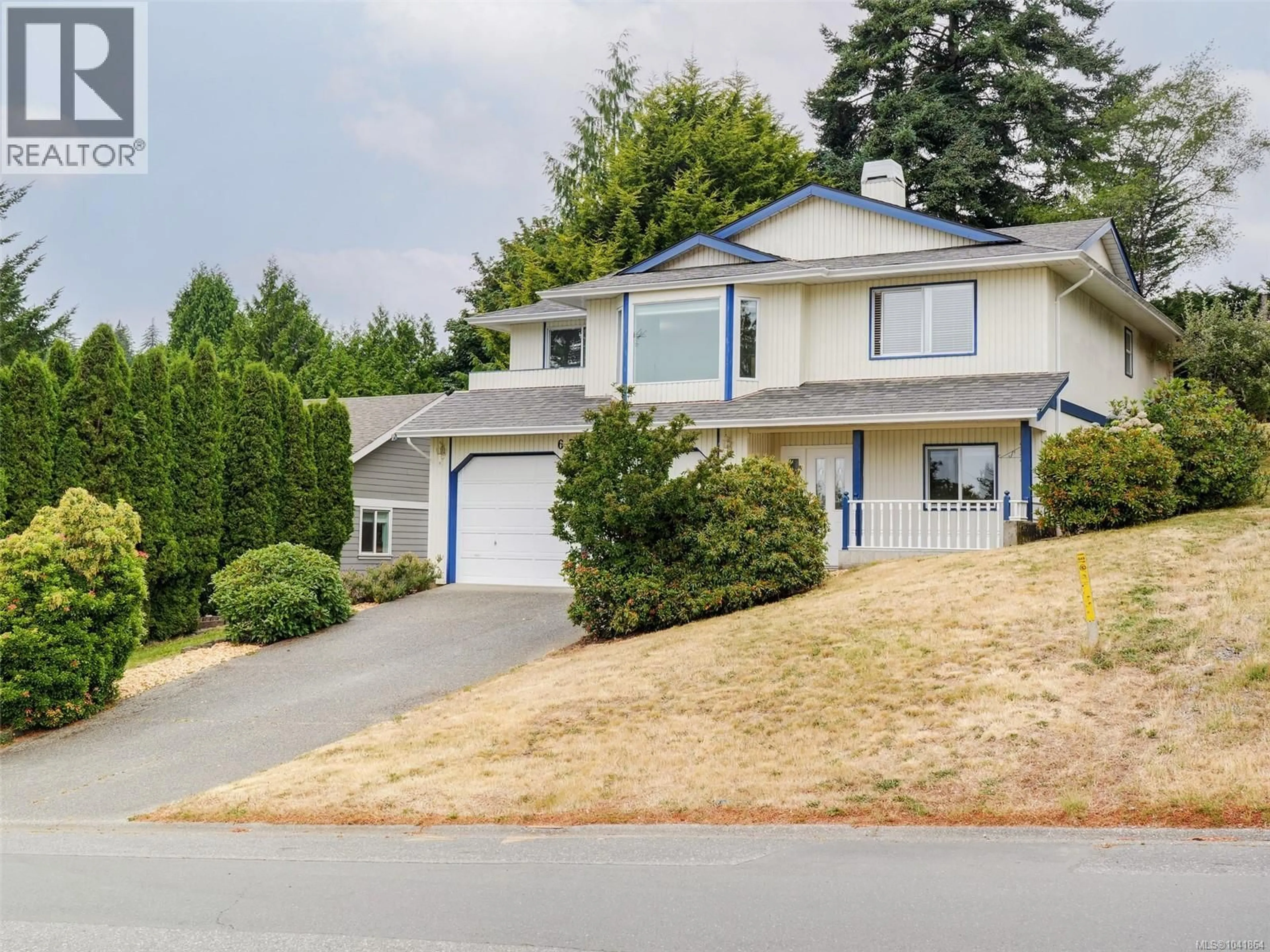 Home with vinyl exterior material, street for 6764 RHODONITE DRIVE, Sooke British Columbia V9Z0H5