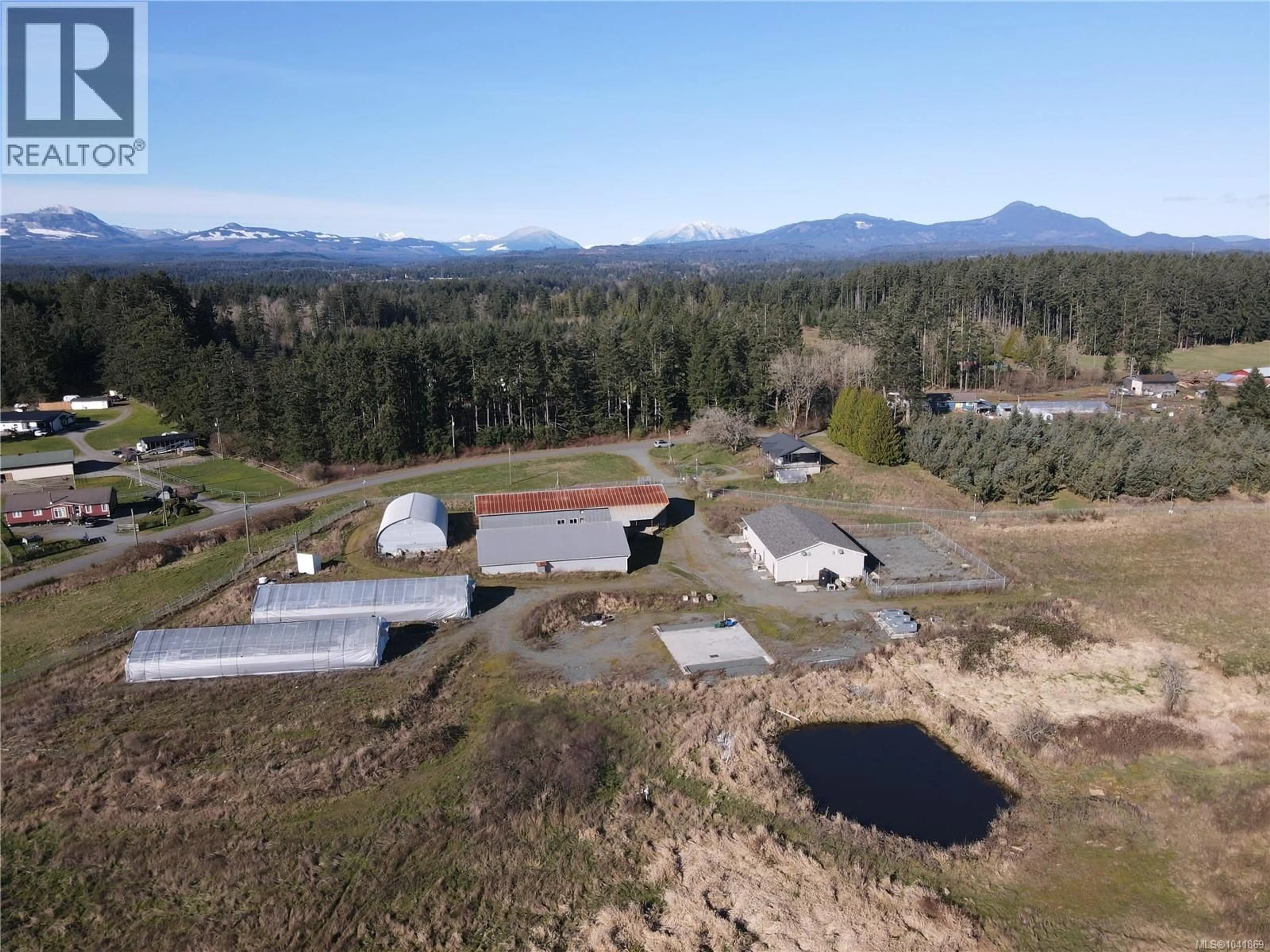 A pic from outside/outdoor area/front of a property/back of a property/a pic from drone, mountain view for 2550 QUENNELL ROAD, Nanaimo British Columbia V9X1K4