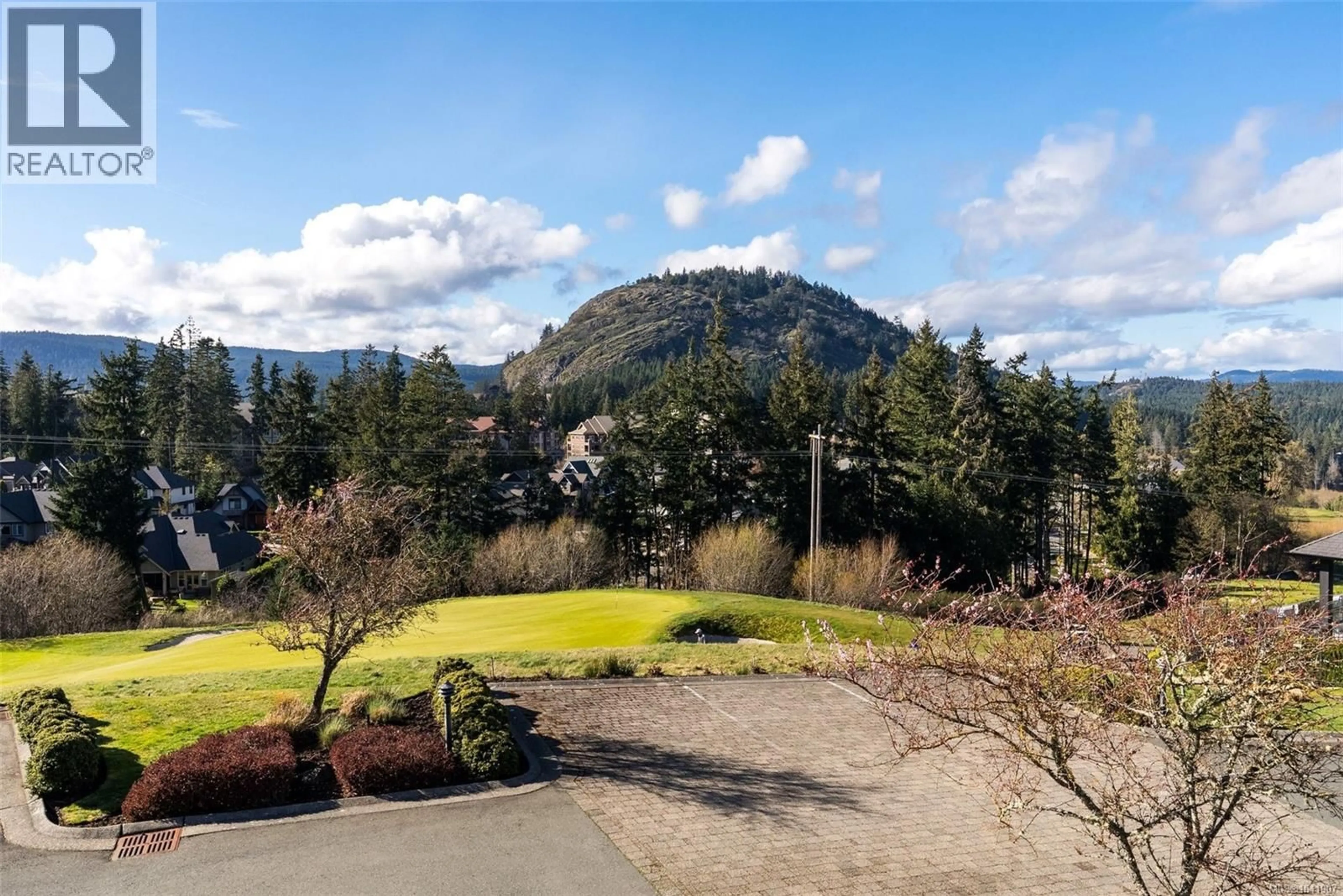A pic from outside/outdoor area/front of a property/back of a property/a pic from drone, mountain view for 104 - 1244 MUIRFIELD PLACE, Langford British Columbia V9B6T3