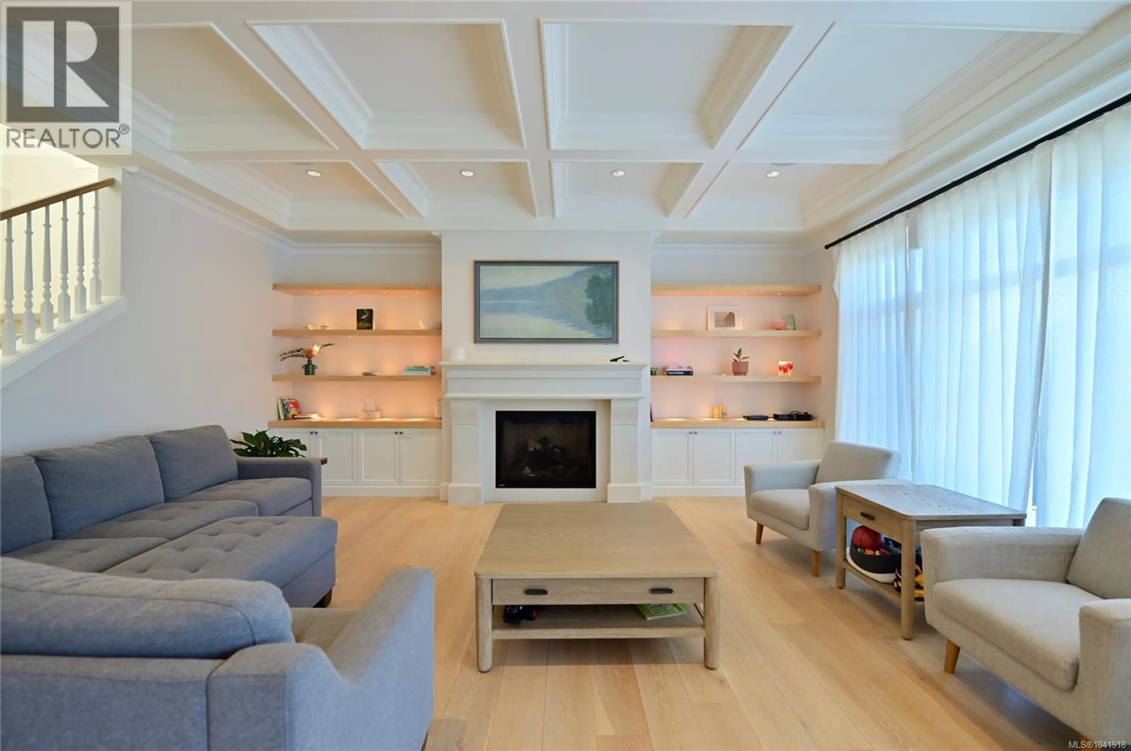 Living room with furniture, wood/laminate floor for 2777 DEWDNEY AVENUE, Oak Bay British Columbia V8R3M3