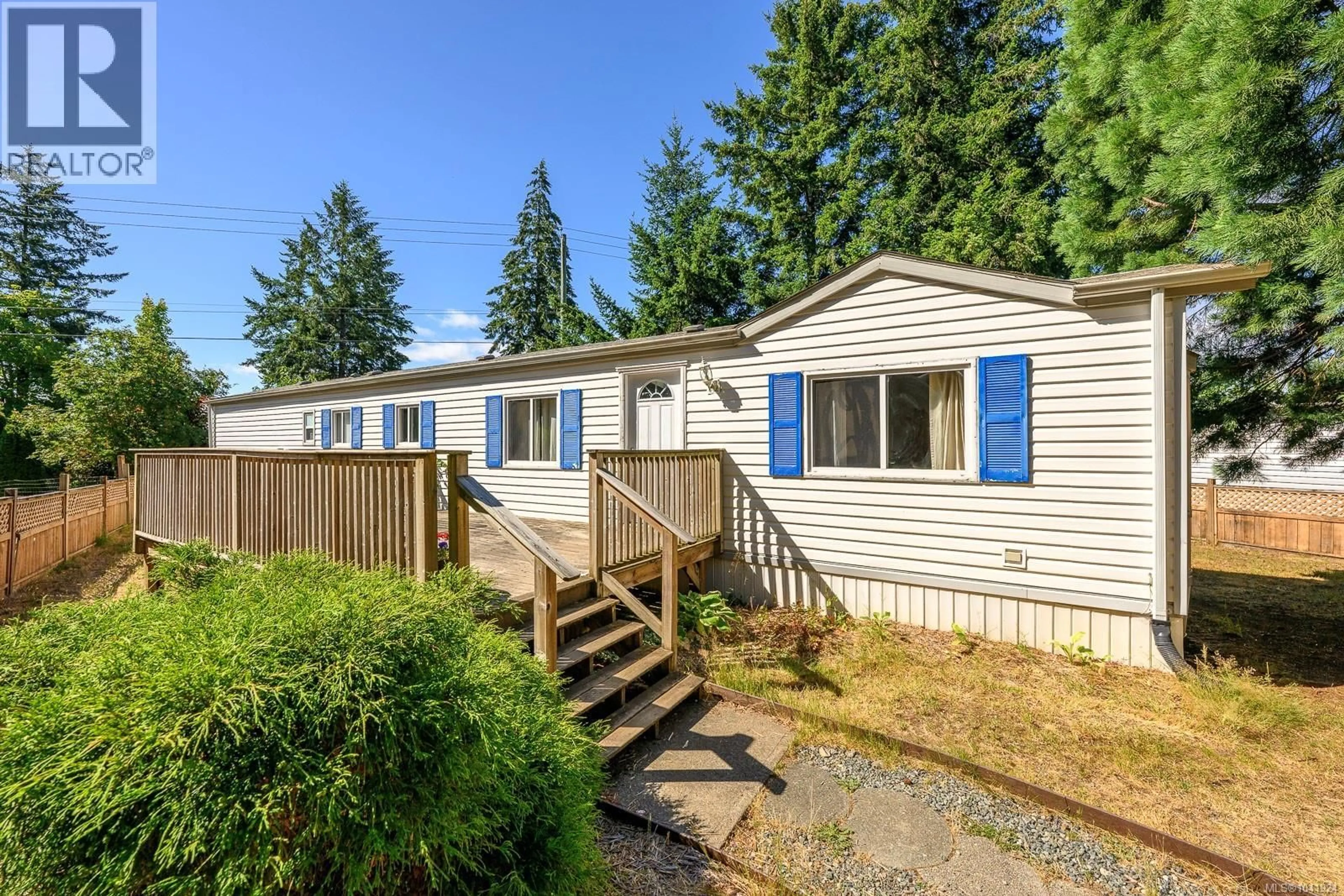 Home with vinyl exterior material, street for 2179 STADACONA DRIVE, Comox British Columbia V9M3P9
