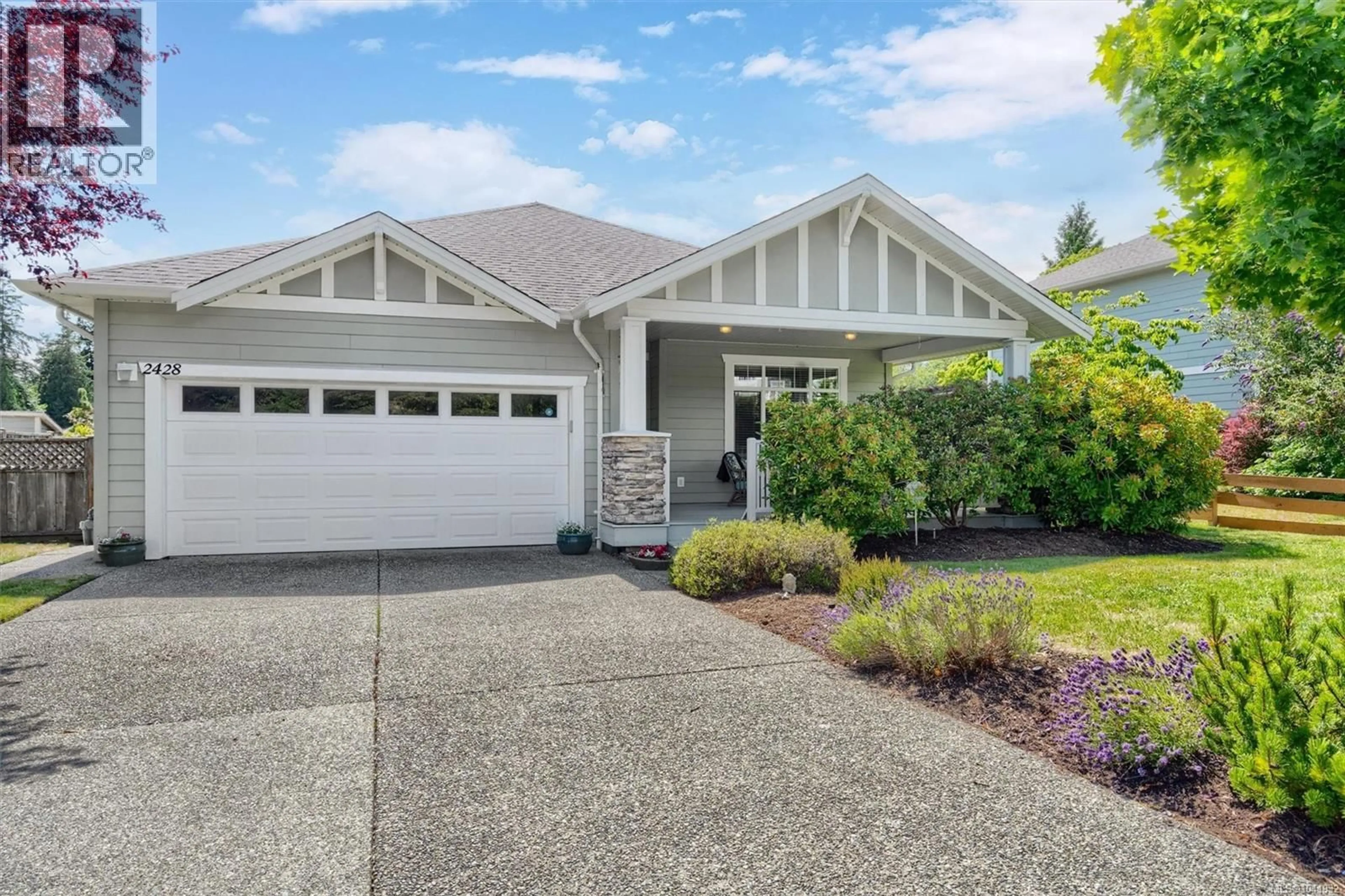Home with vinyl exterior material, street for 2428 SUNRIVER WAY, Sooke British Columbia V0S1N0