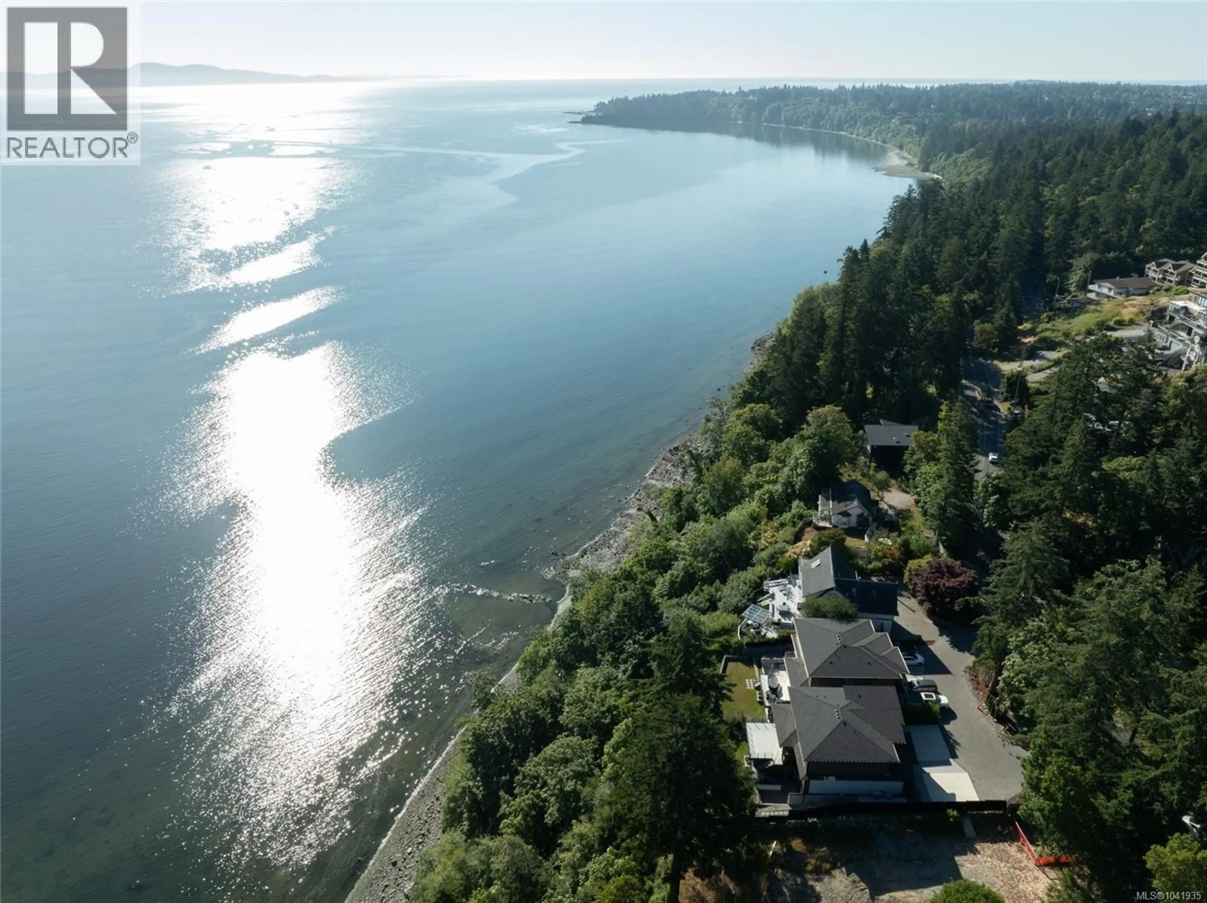 A pic from outside/outdoor area/front of a property/back of a property/a pic from drone, water/lake/river/ocean view for 4599 CORDOVA BAY ROAD, Saanich British Columbia V8Y2K1