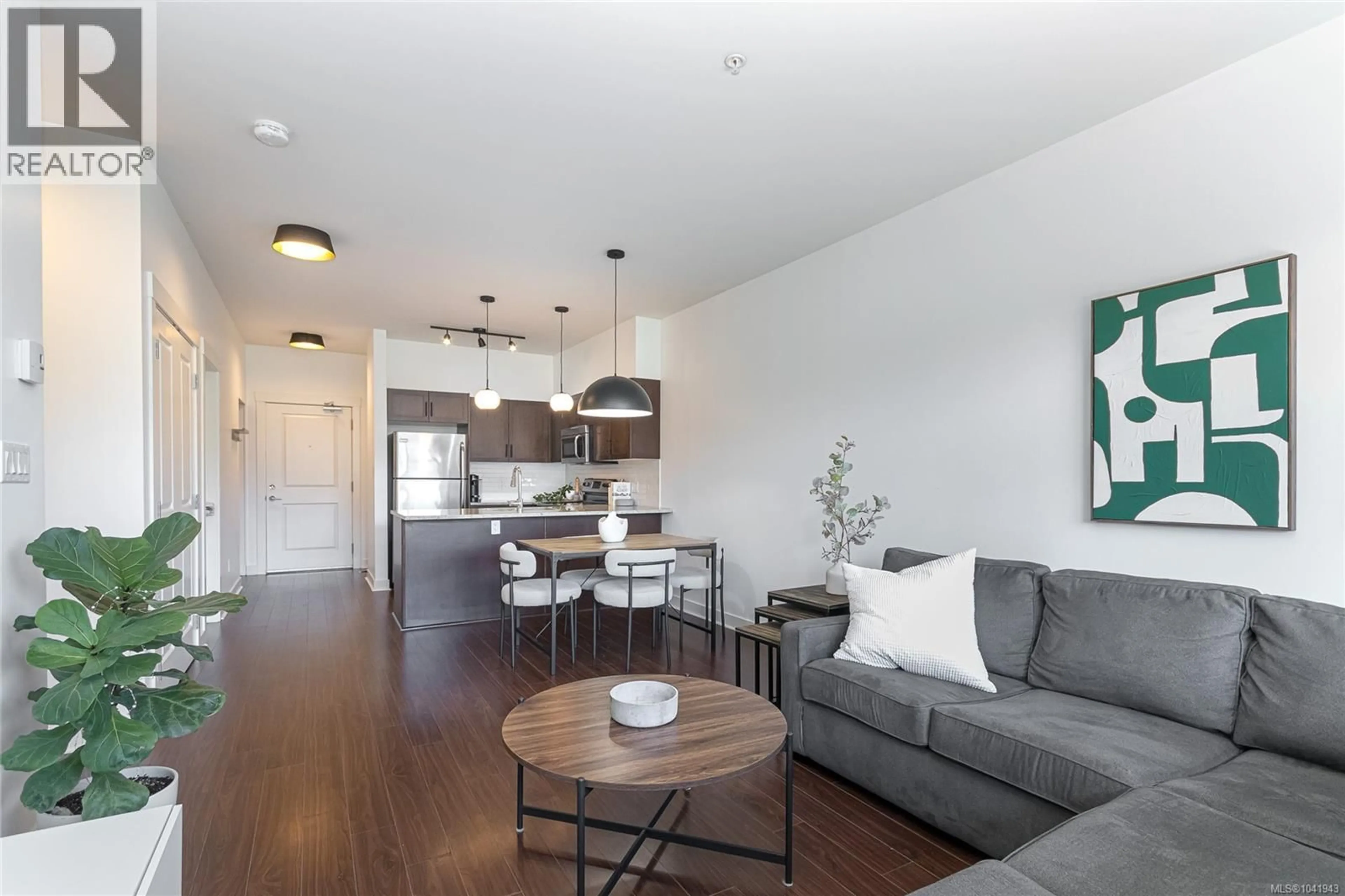 Living room with furniture, wood/laminate floor for 413 - 662 GOLDSTREAM AVENUE, Langford British Columbia V9B0N8
