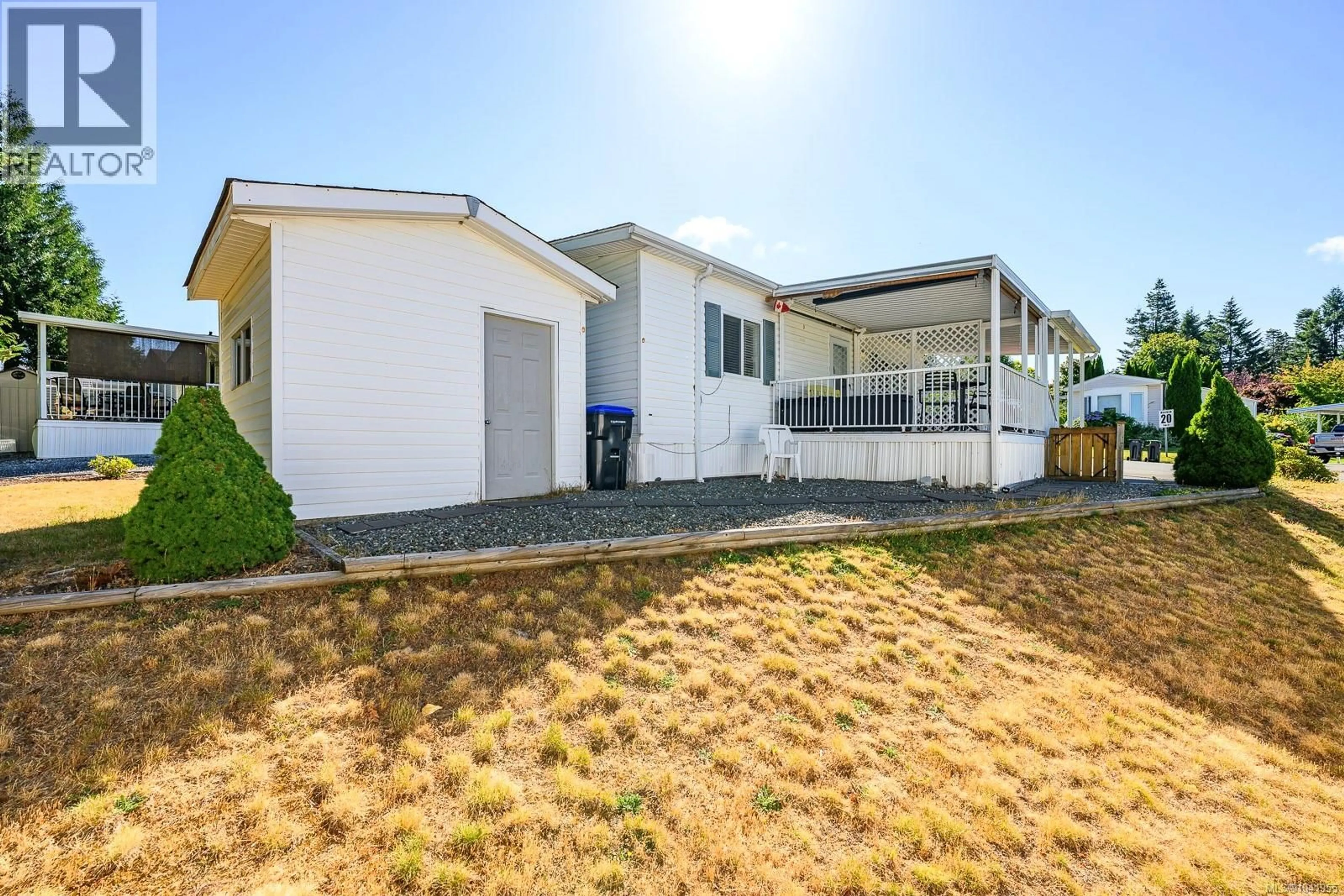 A pic from outside/outdoor area/front of a property/back of a property/a pic from drone, unknown for 94 - 4714 MUIR ROAD, Courtenay British Columbia V9N8Z6