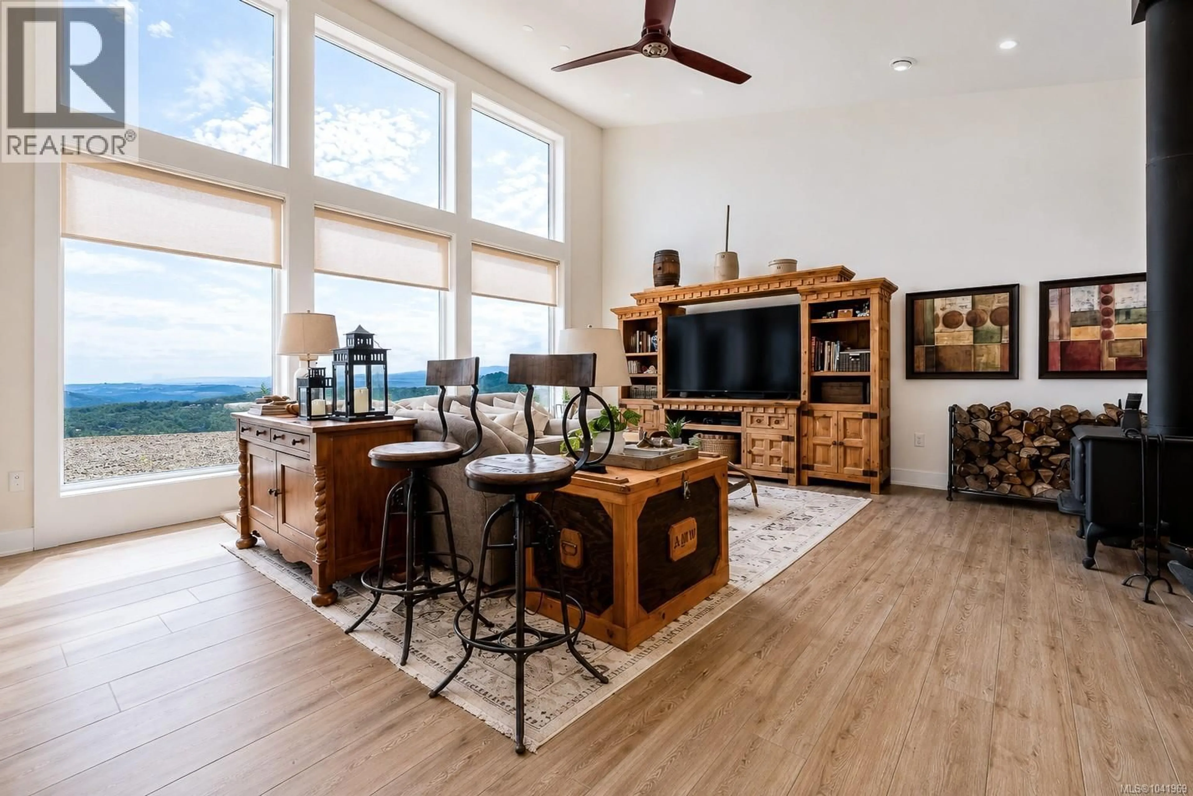 Living room with furniture, wood/laminate floor for 4030 RIDGELINE DRIVE, Shawnigan Lake British Columbia V0R2W3