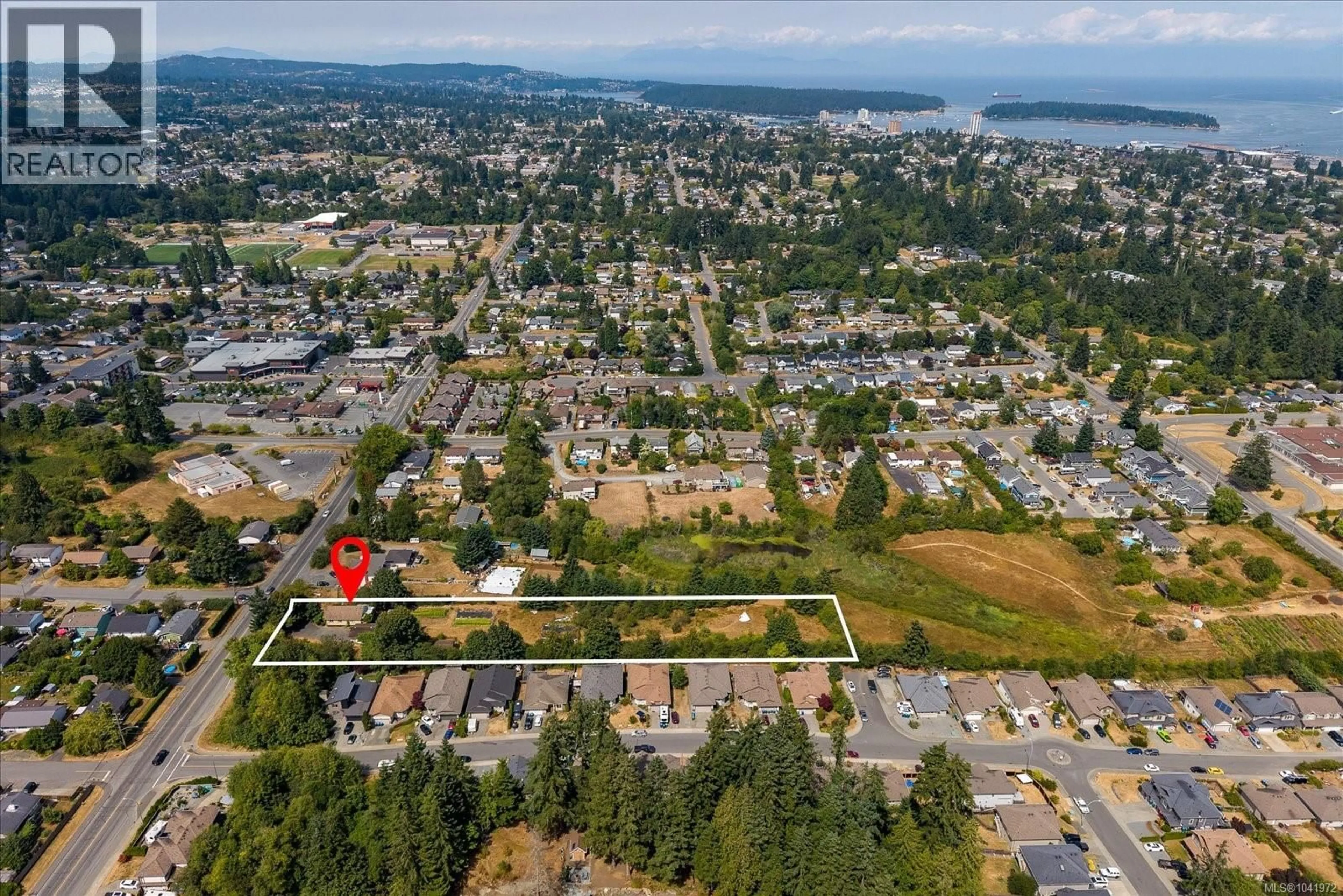 A pic from outside/outdoor area/front of a property/back of a property/a pic from drone, unknown for 950 BRUCE AVENUE, Nanaimo British Columbia V9R4A3