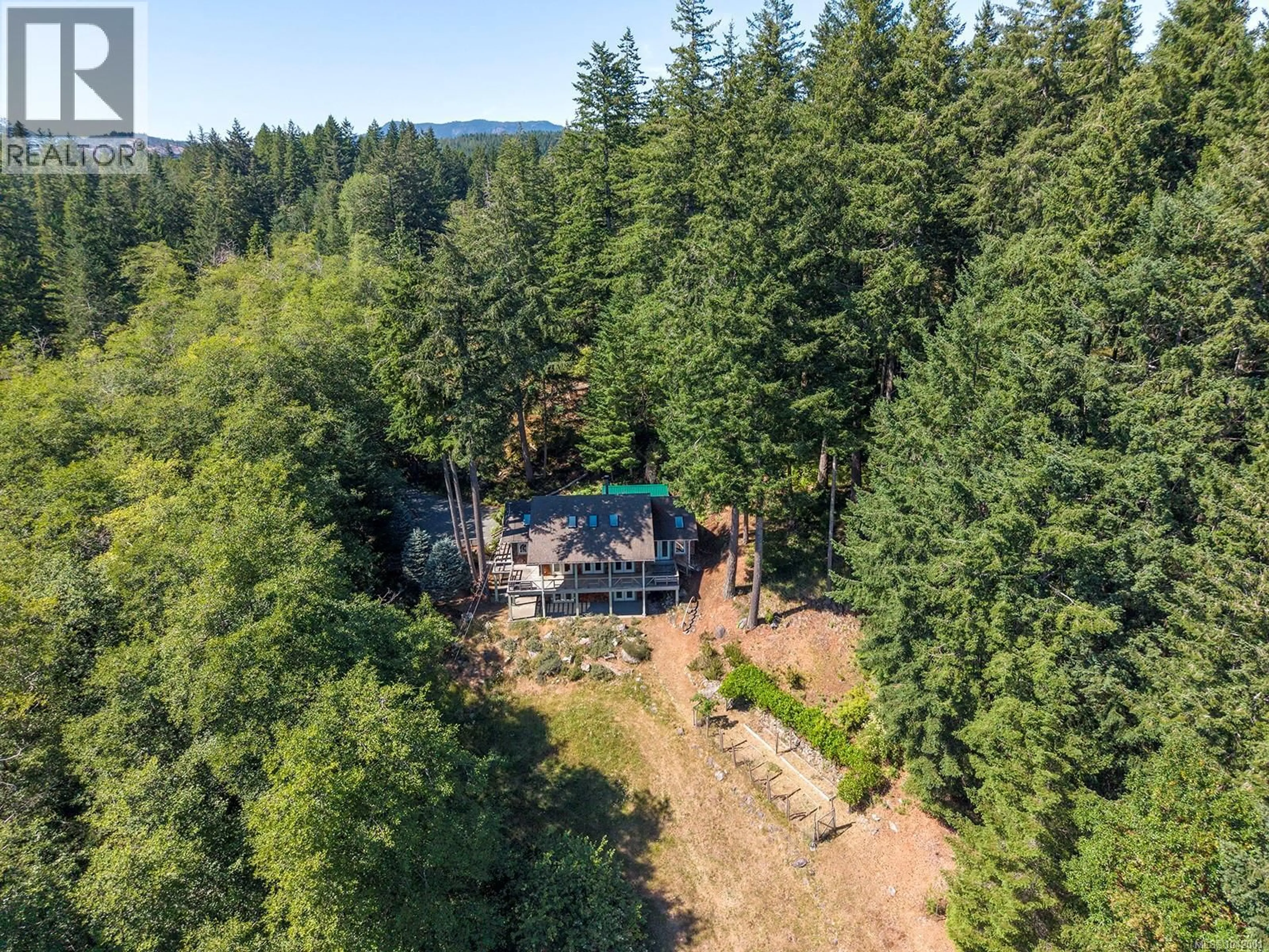 A pic from outside/outdoor area/front of a property/back of a property/a pic from drone, forest/trees view for 865 GOWLLAND HARBOUR ROAD, Quadra Island British Columbia V0P1N0