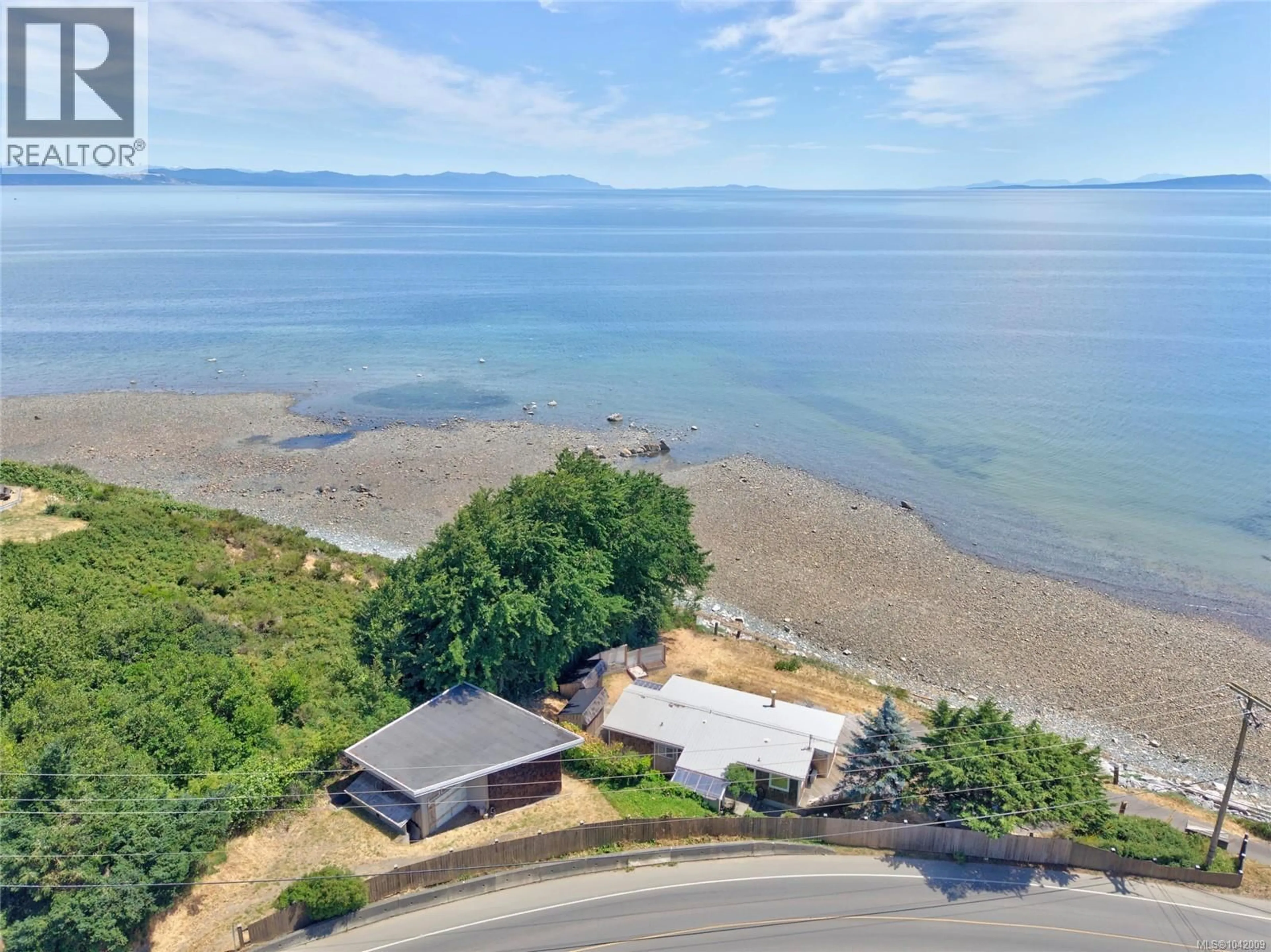 A pic from outside/outdoor area/front of a property/back of a property/a pic from drone, water/lake/river/ocean view for 343 LAZO ROAD, Comox British Columbia V9M3T9