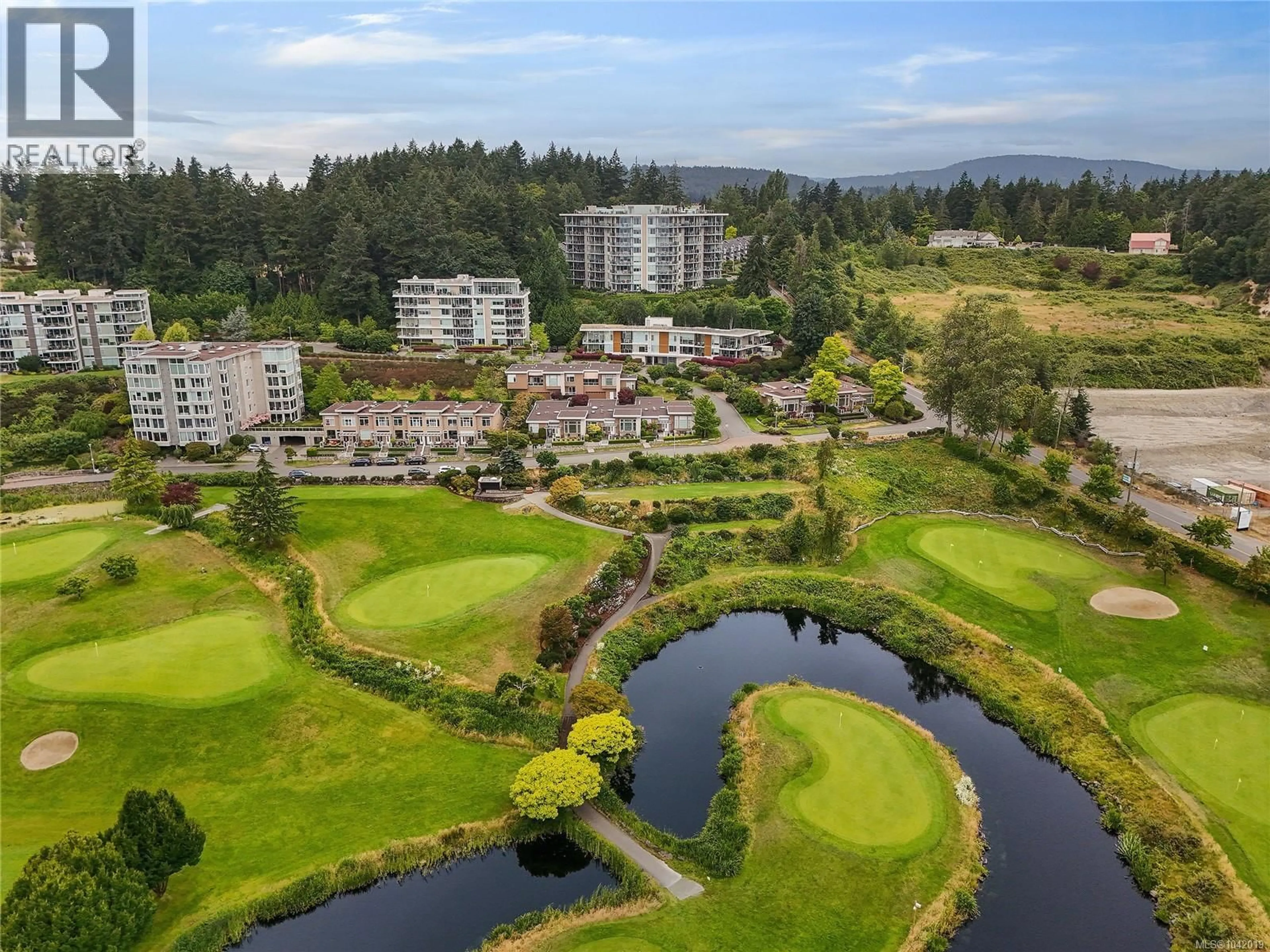 A pic from outside/outdoor area/front of a property/back of a property/a pic from drone, water/lake/river/ocean view for 504 - 5388 HILL RISE TERRACE, Saanich British Columbia V8Y3K3