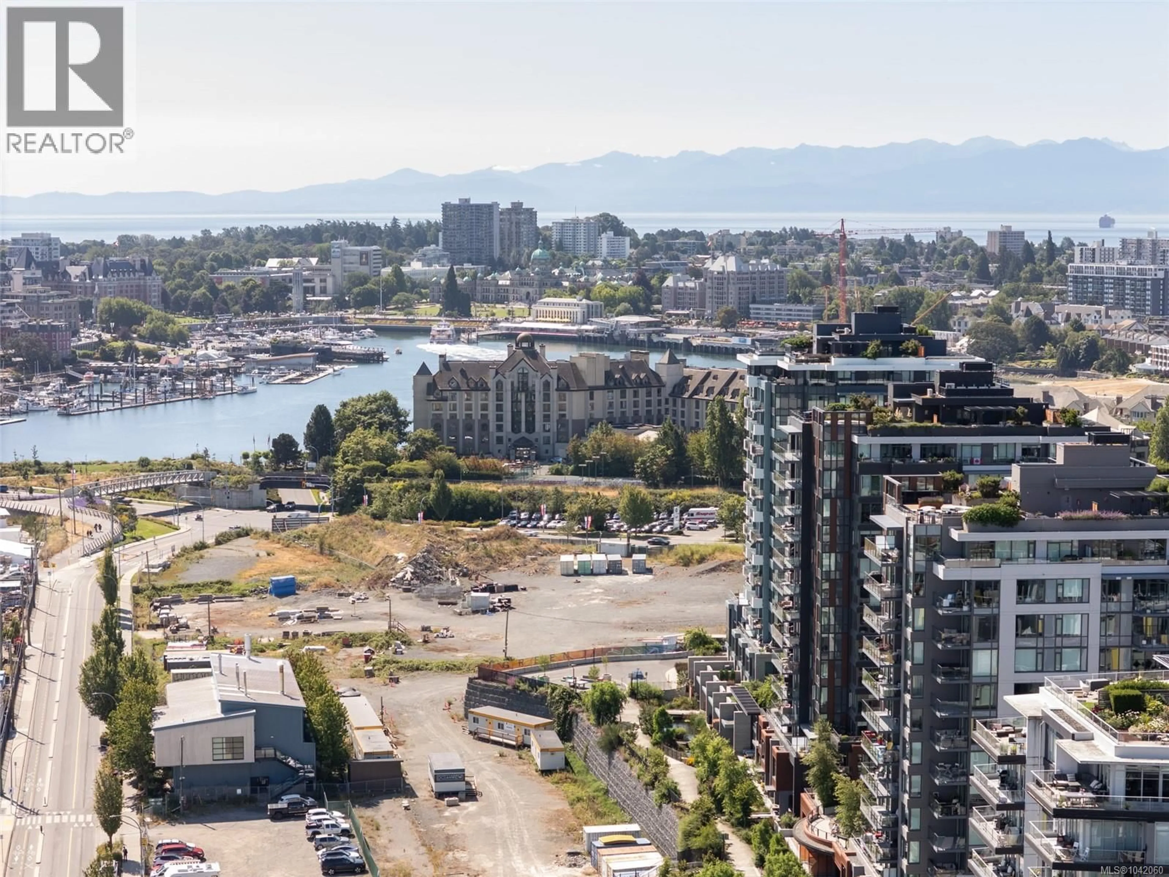 A pic from outside/outdoor area/front of a property/back of a property/a pic from drone, water/lake/river/ocean view for 705 - 369 TYEE ROAD, Victoria British Columbia V9A0B6