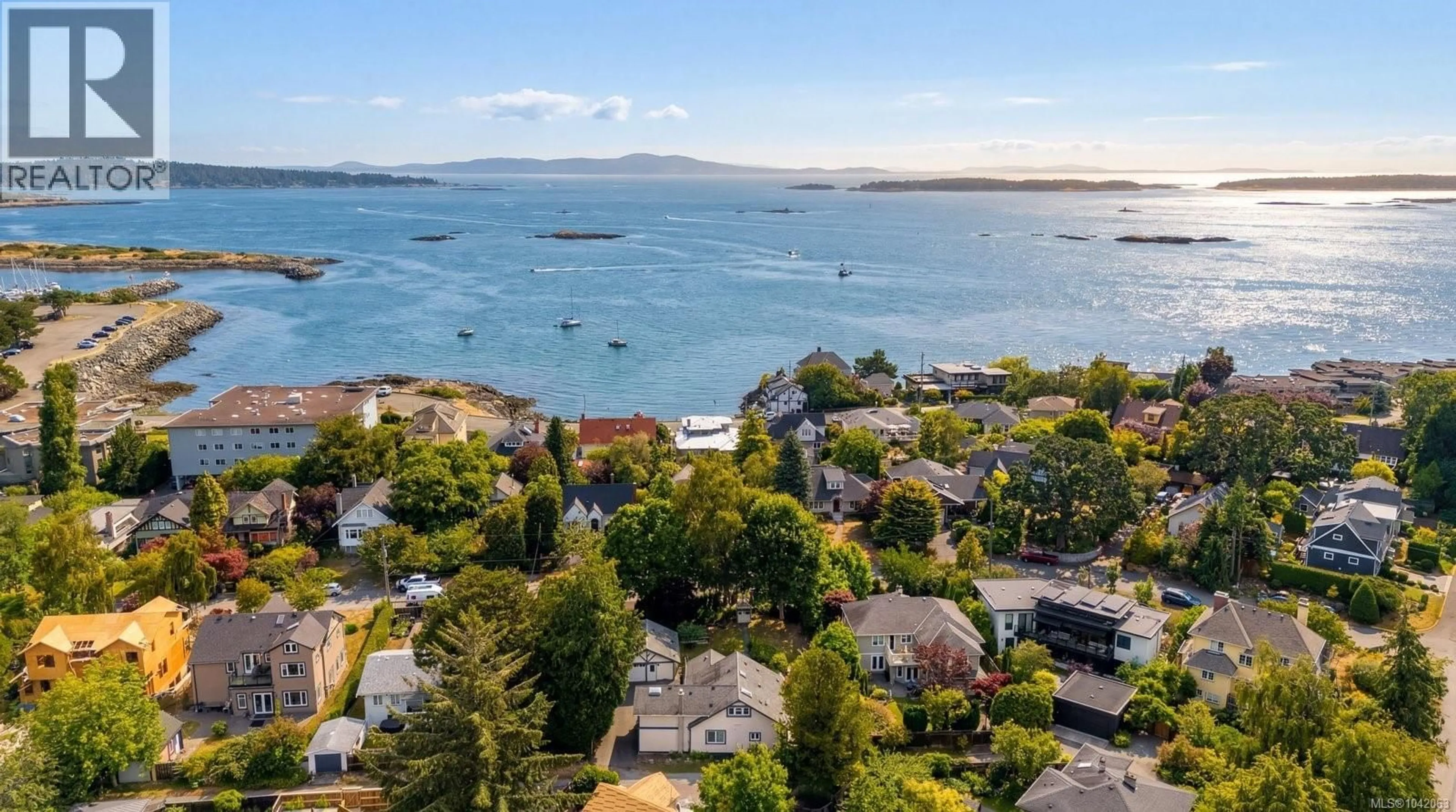 A pic from outside/outdoor area/front of a property/back of a property/a pic from drone, water/lake/river/ocean view for 1036 DEAL STREET, Oak Bay British Columbia V8S5G5
