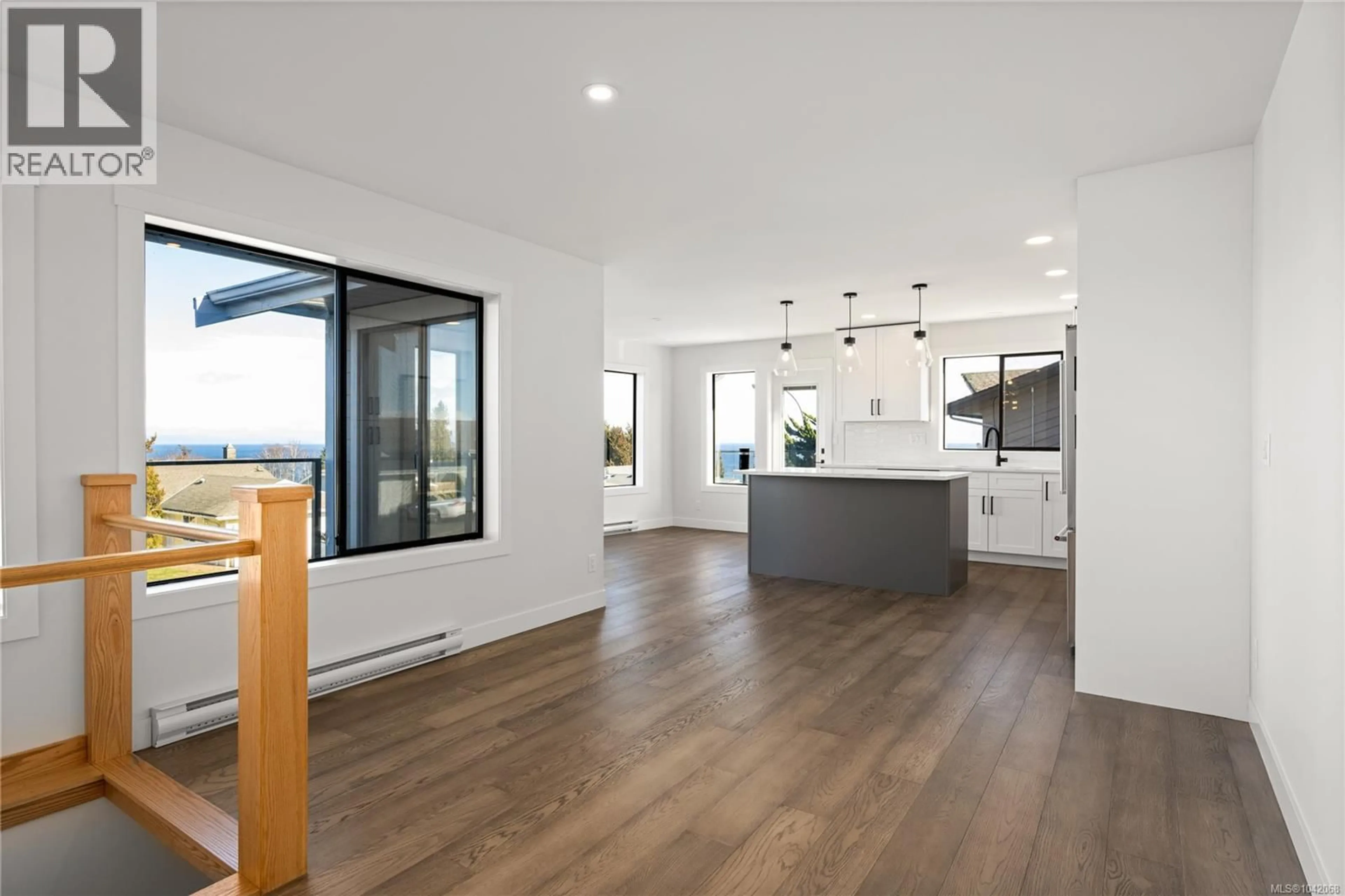 Open concept kitchen, wood/laminate floor for 819 ATHENA PLACE, Nanaimo British Columbia V9V1B9