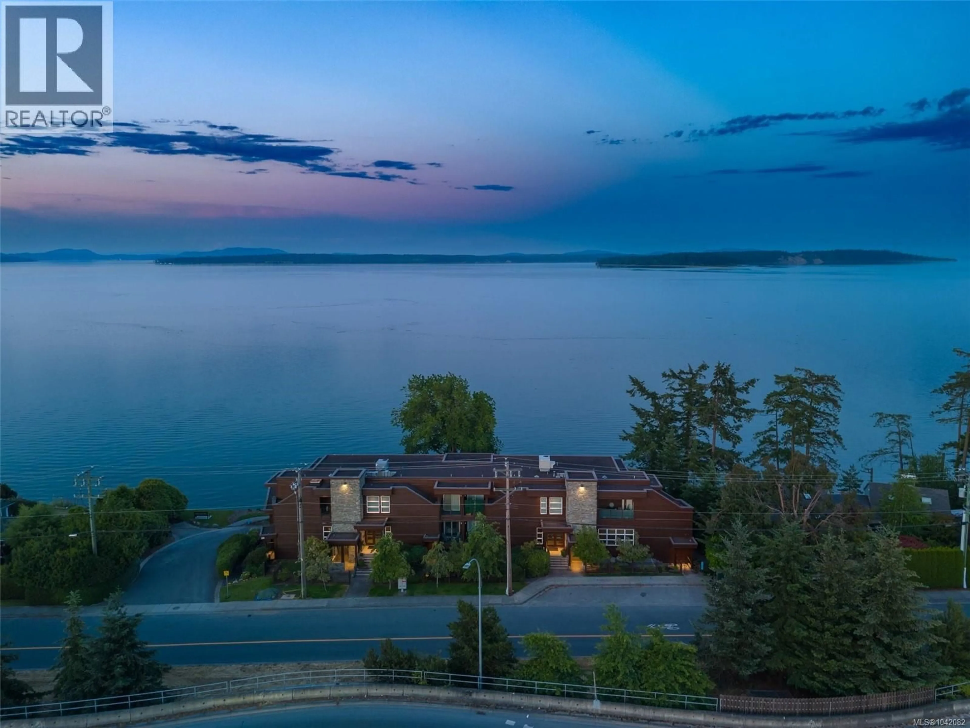 A pic from outside/outdoor area/front of a property/back of a property/a pic from drone, water/lake/river/ocean view for 302 - 9115 LOCHSIDE DRIVE, North Saanich British Columbia V8L1N1