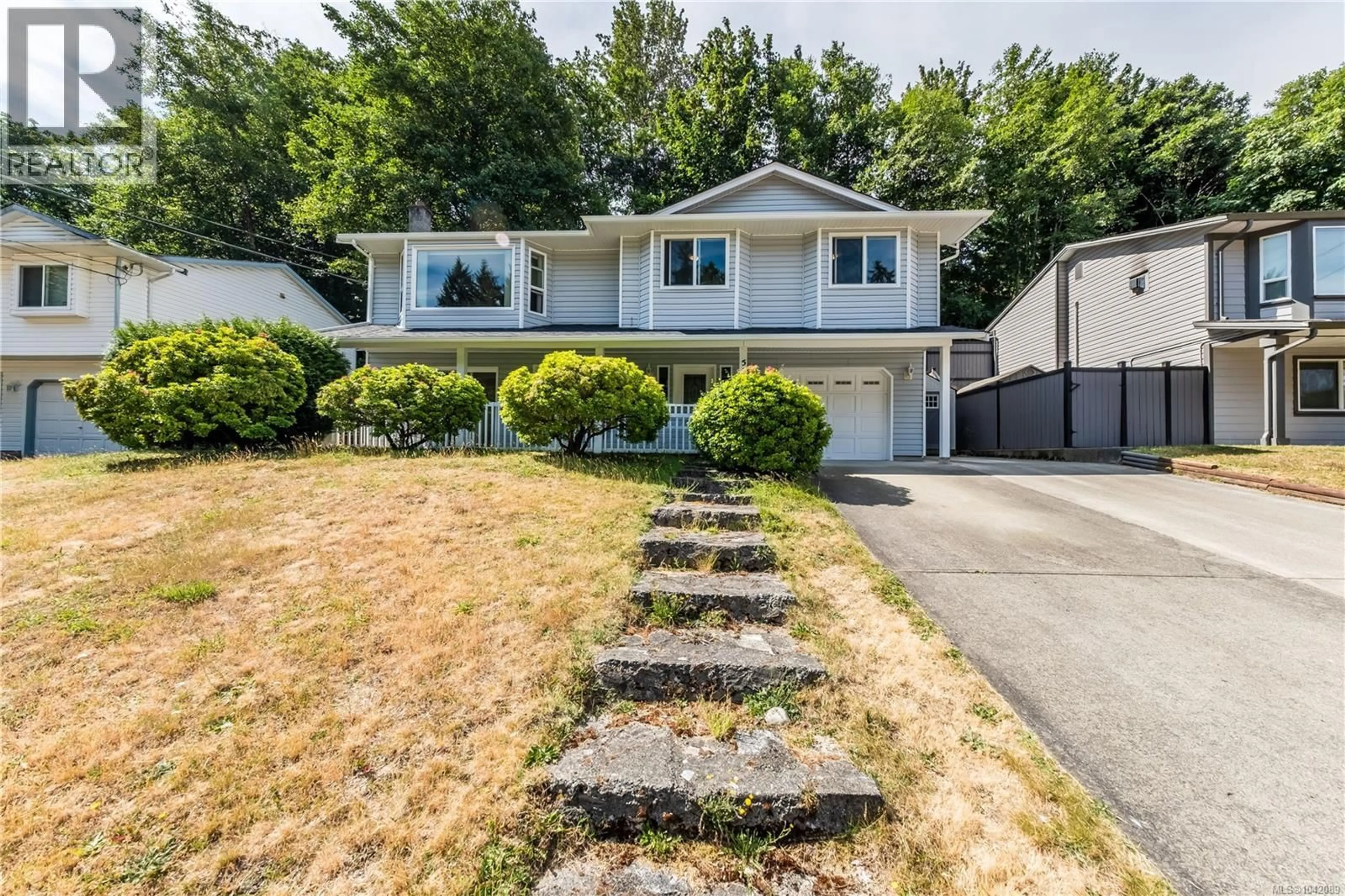 Home with vinyl exterior material, street for 5679 BROOKWOOD DRIVE, Nanaimo British Columbia V9T5P3