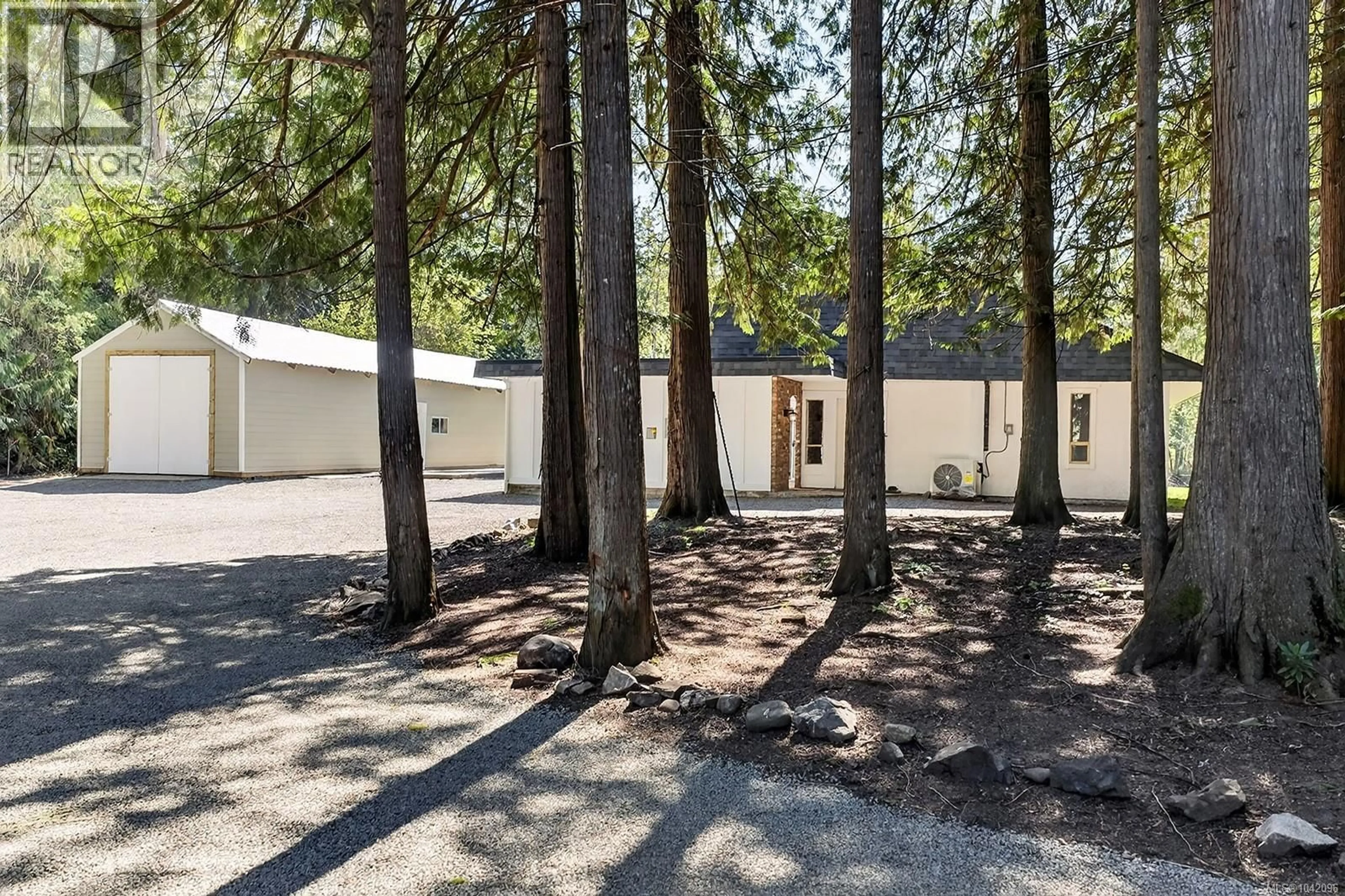 A pic from outside/outdoor area/front of a property/back of a property/a pic from drone, forest/trees view for 400 MANSE ROAD, French Creek British Columbia V9Y2B2